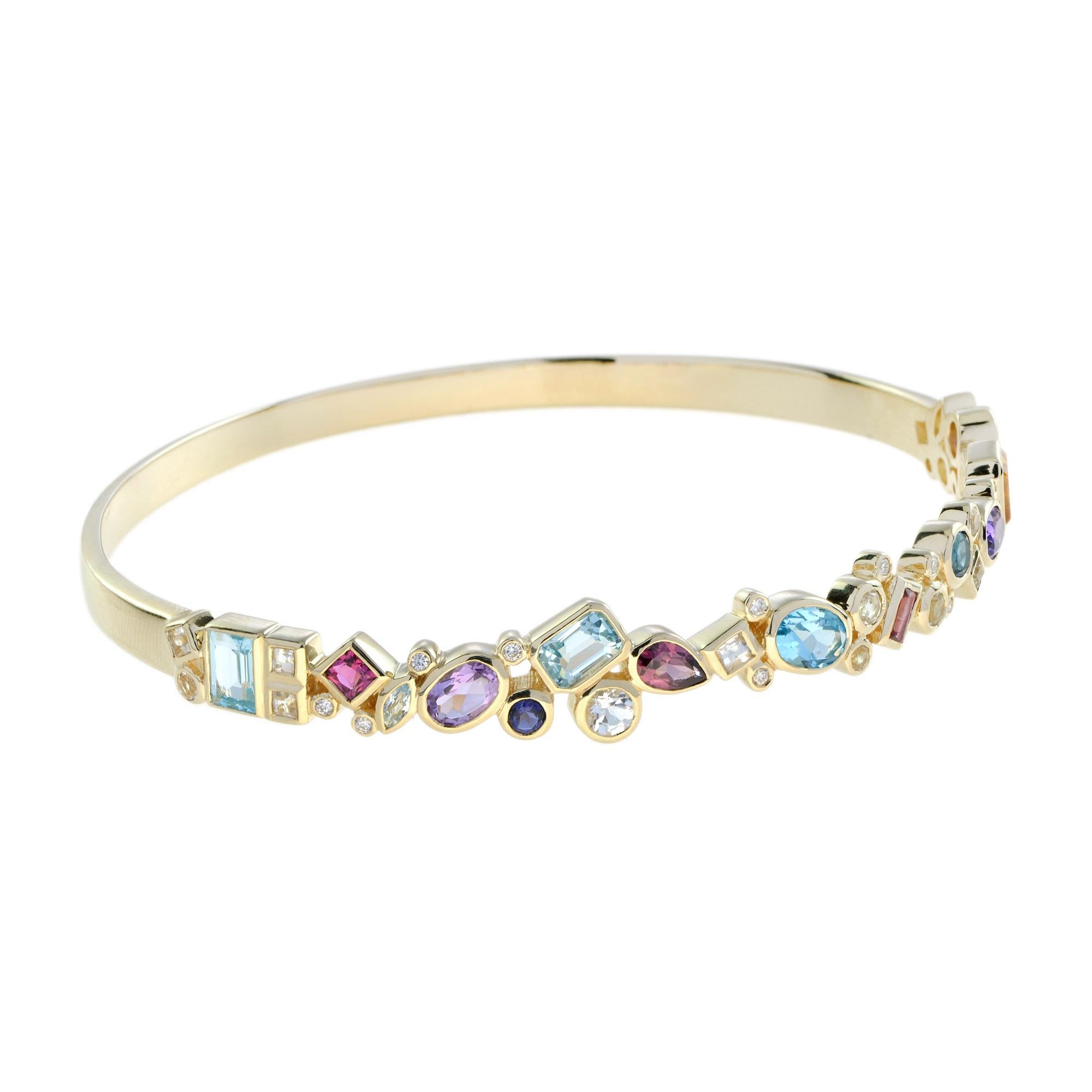 Celebrate color every day with this cheerful multi-gemstone cuff bangle bracelet. Its irresistible design features various-shaped stones of various sizes, including pink and white topaz, London, Swiss, sky blue topaz, amethyst, citrine, iolite, and