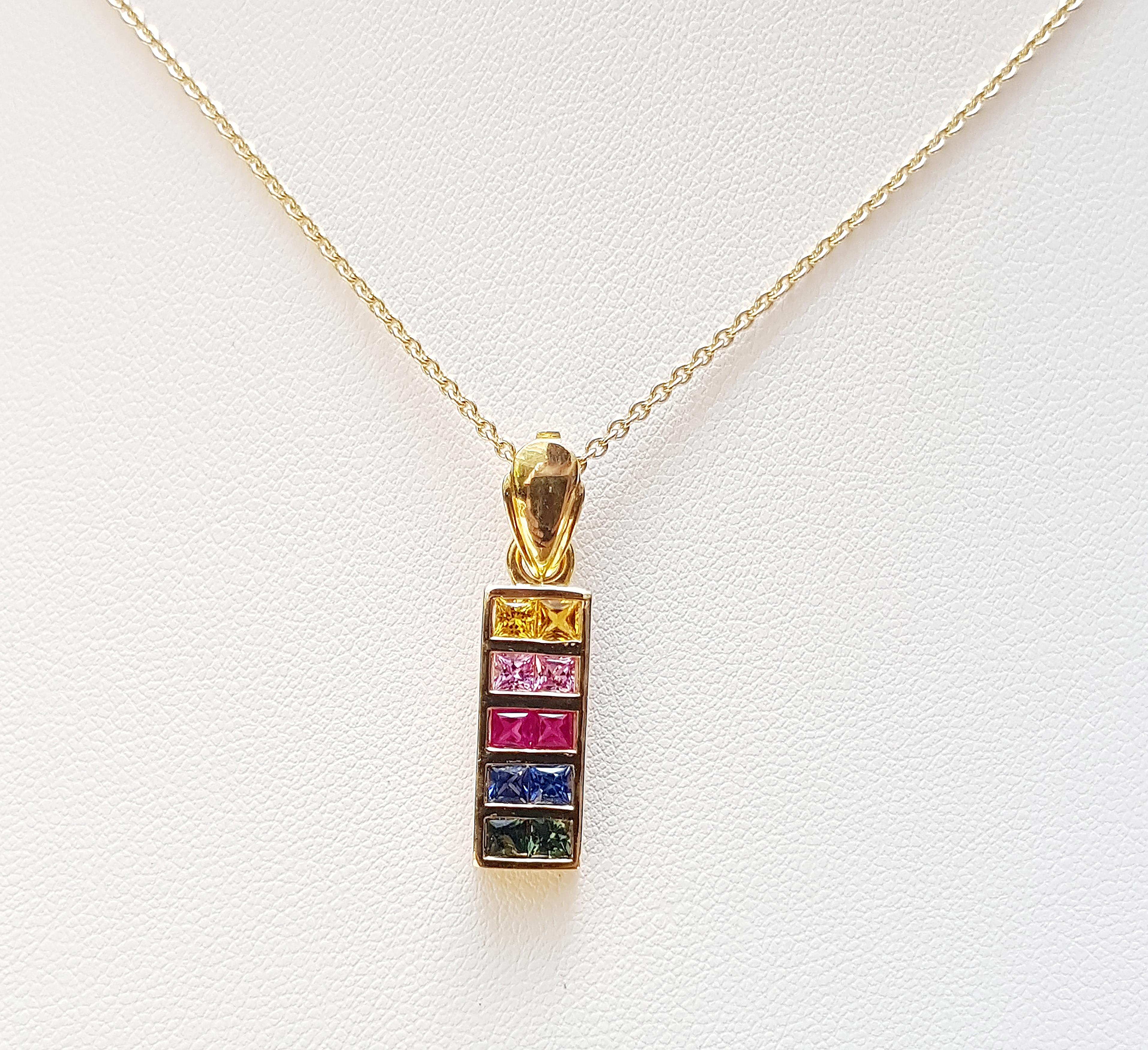 Rainbow Colour Sapphire 1.39 carats Pendant set in 18 Karat Gold Settings
(chain not included)

Width:  0.7 cm 
Length: 2.7 cm
Total Weight: 4.18 grams

