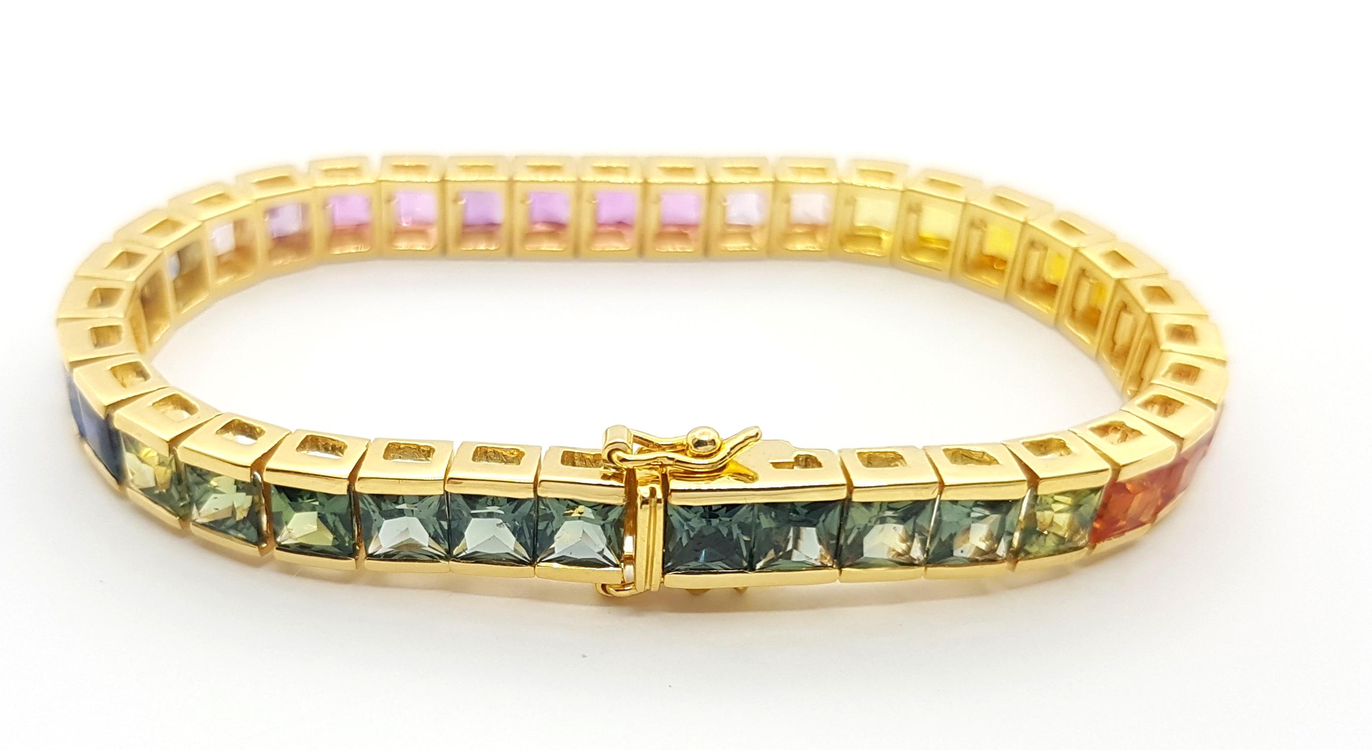 Women's or Men's Rainbow Colour Sapphire Tennis Bracelet set in 18K Gold Settings For Sale