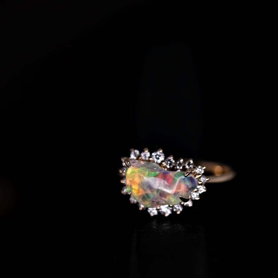 Rainbow Dream - 2.33ct Mexican Fire Opal Halo Diamond Engagement Ring 18K Yellow Gold.



Design name: Rainbow Dream

Design Idea: This stunning Rainbow Dream ring features a mesmerizing 2.33ct Mexican Fire Opal with an incredible play of rainbow