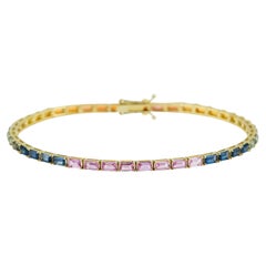 Bracelet tennis en saphirs taille émeraude arc-en-ciel de 7,75 carats