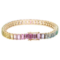 Pastellarmband mit Regenbogen-Edelsteinen im Smaragdschliff aus 18 Karat Gold