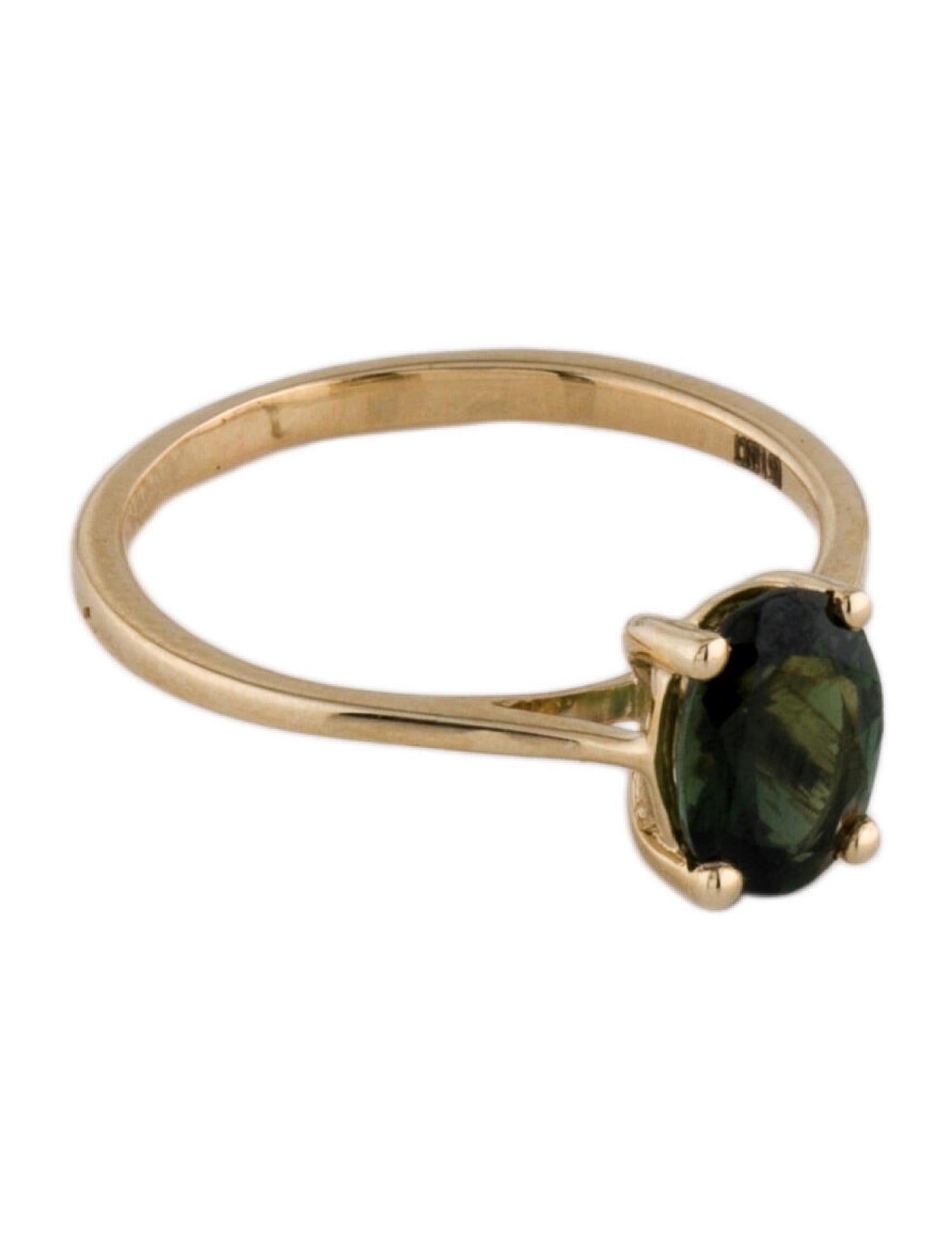 Immerse yourself in the mesmerizing allure of our Rainbow Gemstone Radiance Green Tourmaline Ring from the Jeweltique collection. This exquisite piece is a celebration of nature's diverse beauty, capturing the enchanting kaleidoscope of colors found