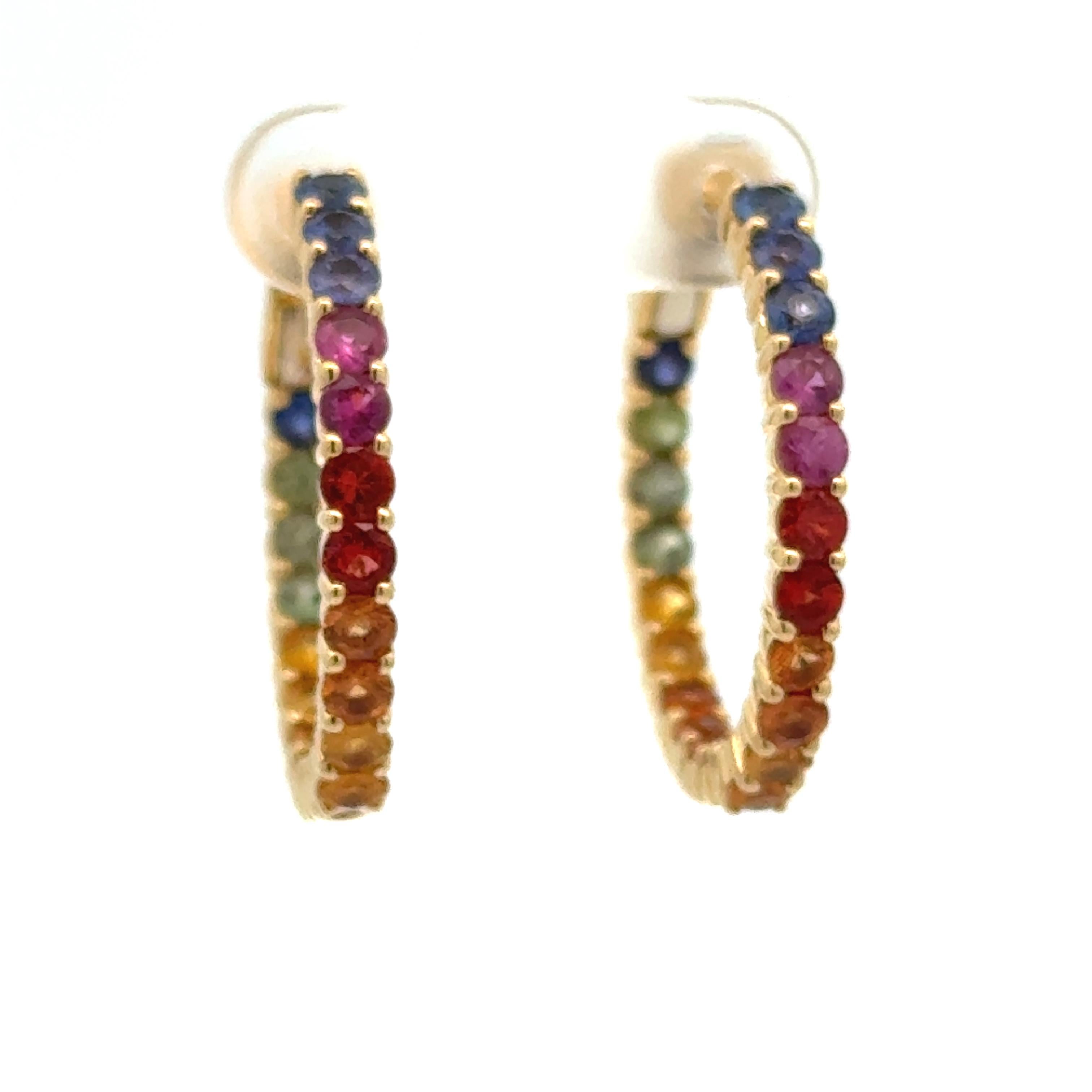These Rainbow Inside-Outside 18K Yellow Gold Hoop Earrings are beautifully made with prong set round colorful gemstones including iolite and citrine.

Metal Type : 18K Yellow Gold
Weight : 11.34 grams
Mixed Round Gemstones : (42) Approximately 2.00