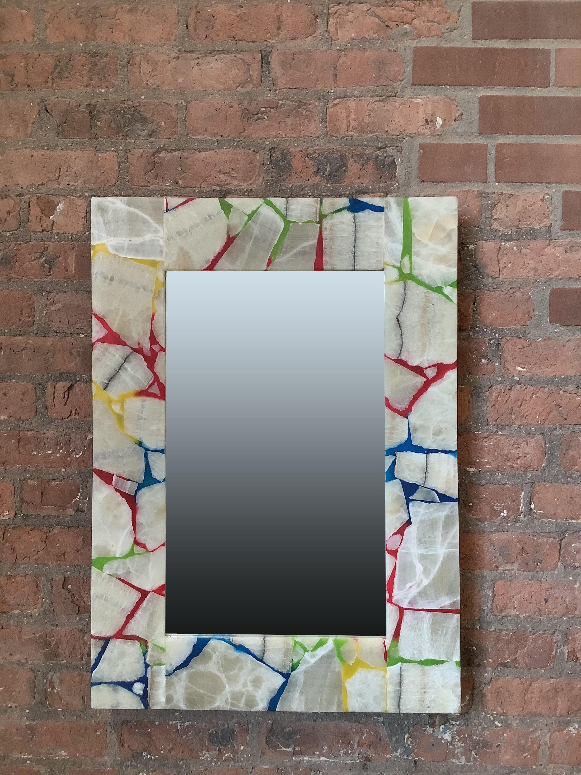 Carved Rainbow Mirror with Onyx Frame For Sale