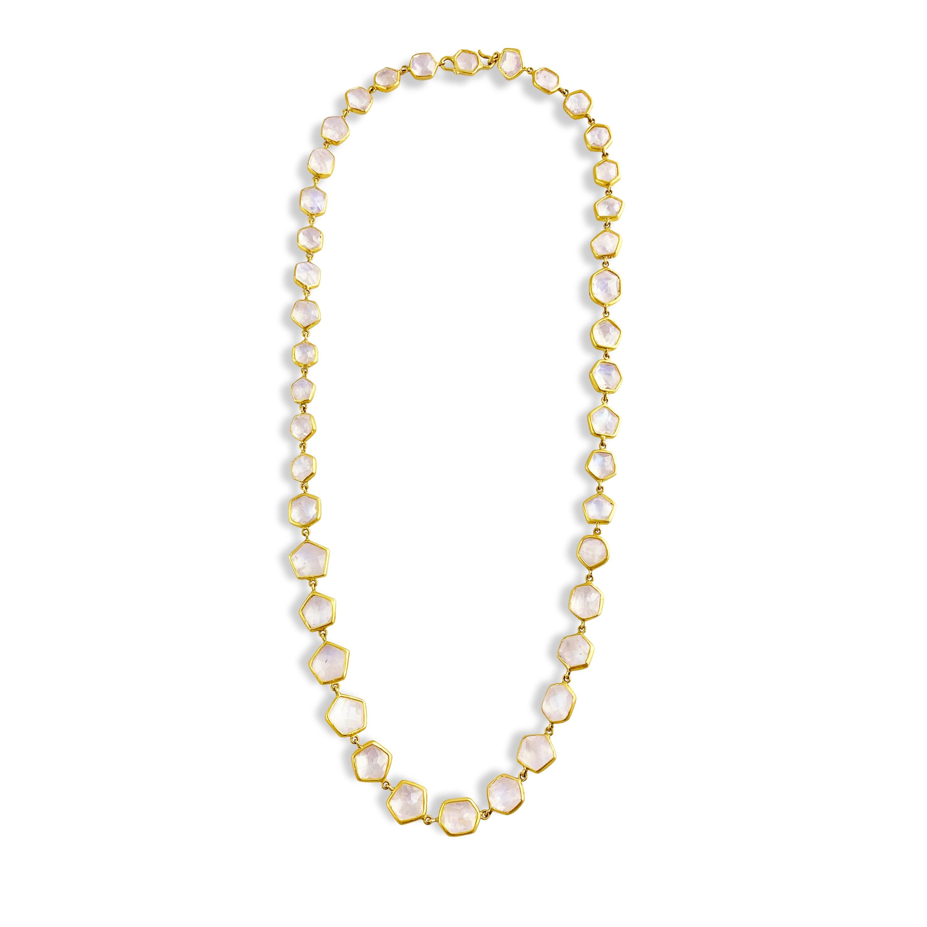 Designed with 85.30-carats of glistening rainbow moonstone , this 22-karat gold necklace has an ethereal quality. Wear this investment piece against a softly hued dress.
The necklace measures 20