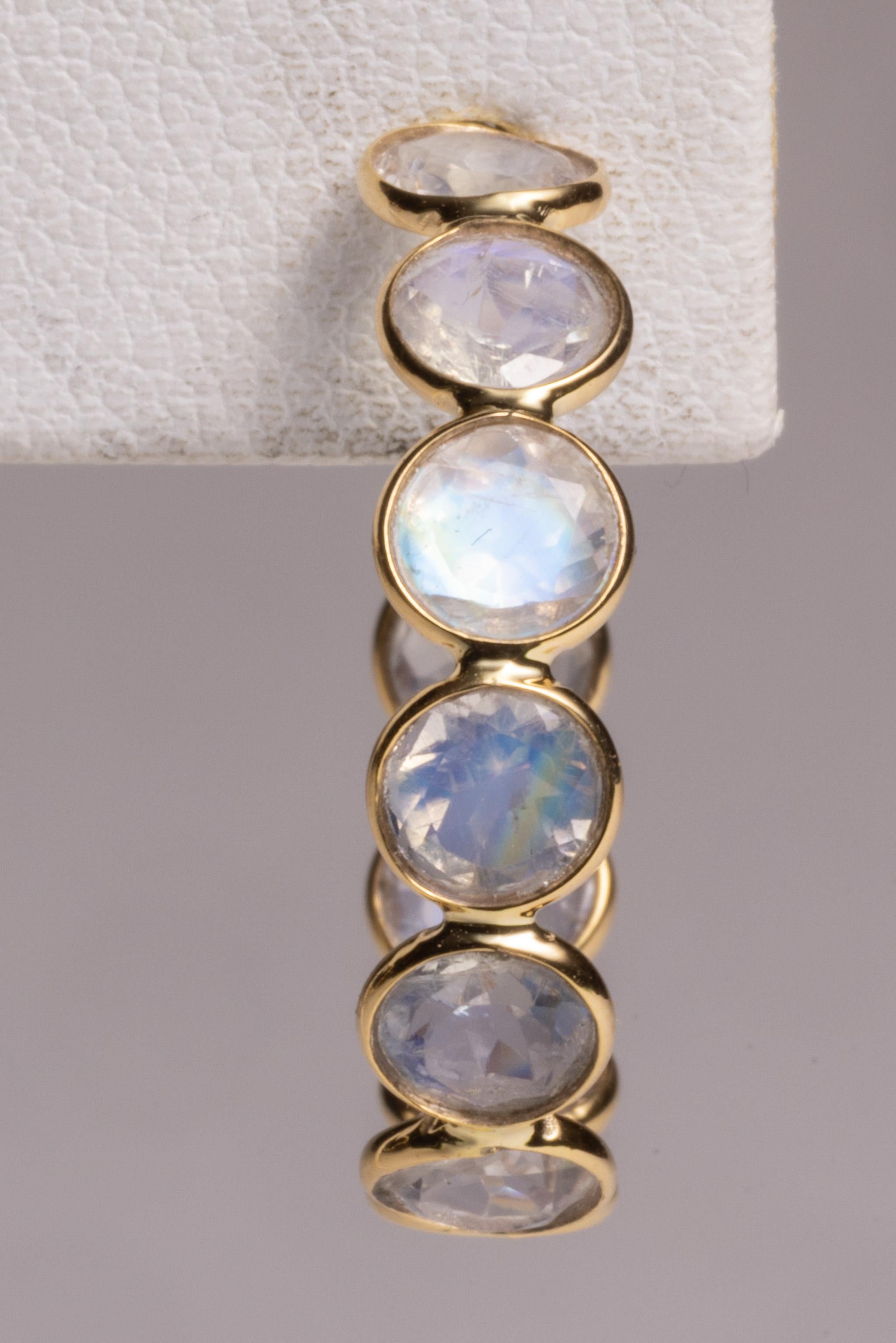 A fabulous pair of 18K gold hoops with 10 faceted, round rainbow moonstones on each earring.  Post for pierced ears.  Moonstones total 8.93 carats.  Unusual to have hoops with gem stones.  