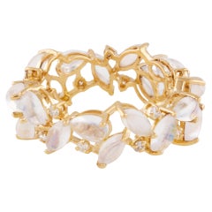 Bague en or jaune 18 carats, pierre de lune arc-en-ciel et diamants