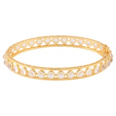 Bracelet jonc rond en or jaune 18 carats avec pierre de lune arc-en-ciel