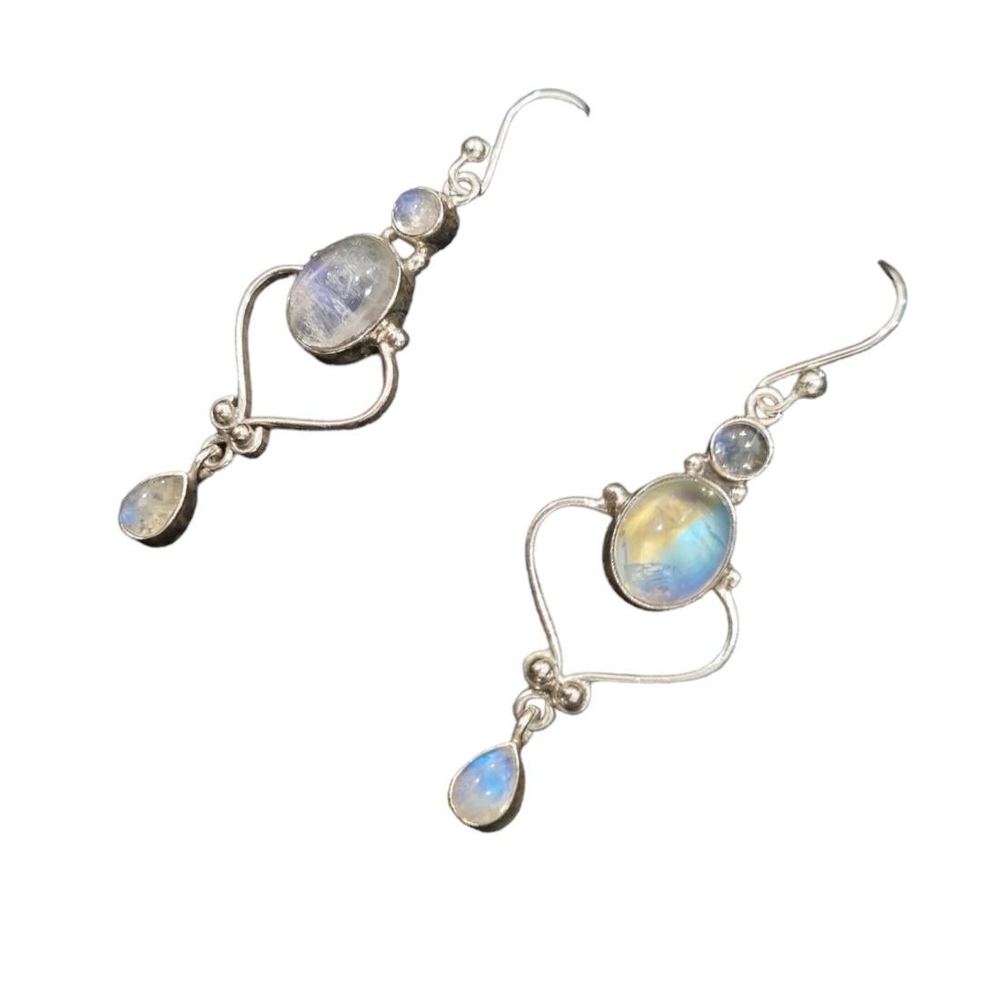 Metal - Sterling silver
Gross Weight - 5.80 Grams
Gemstones - Rainbow Moonstone

Designer elegant rainbow moonstone earrings in sterling silver are a captivating blend of style and elegance. These exquisite pieces showcase the beauty of rainbow