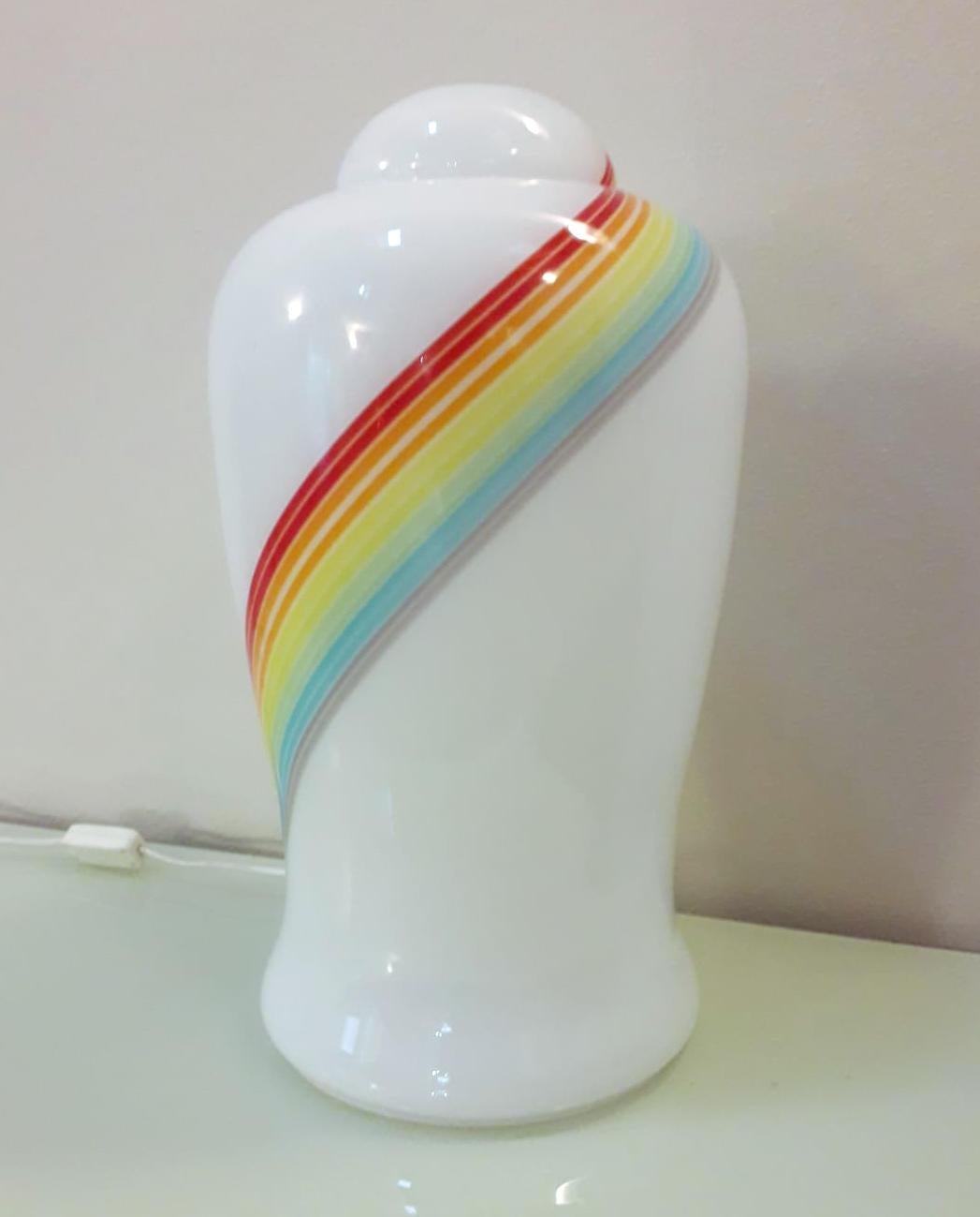 Vintage Italian Murano glass table lamp with frosted white body and a swirl stripe in the colors of rainbow / Made in Italy circa 1960s
Original 