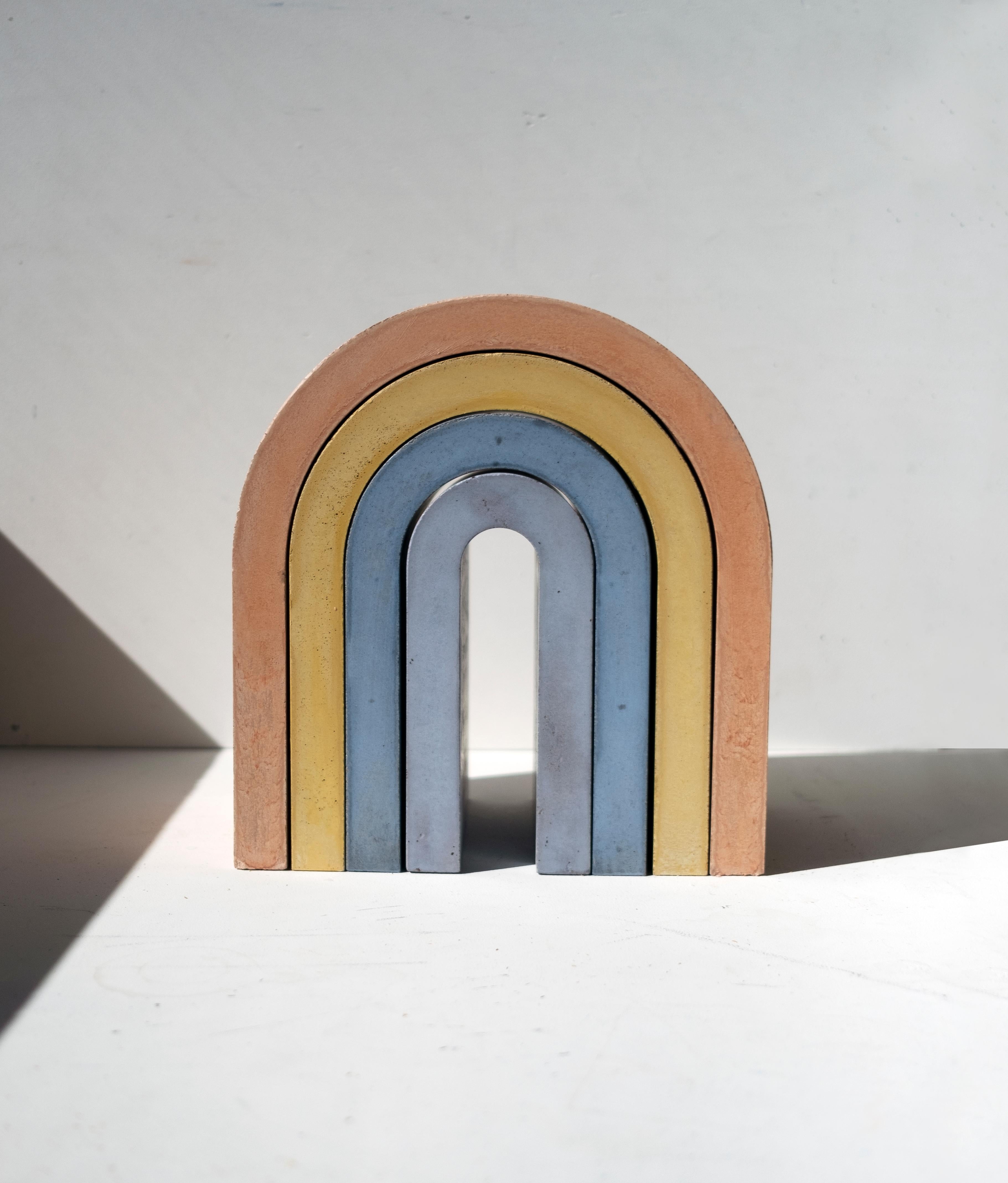 Modern Rainbow Nesting Sculpture, Contemporary Colored Concrete Piece by Erik Olovsson