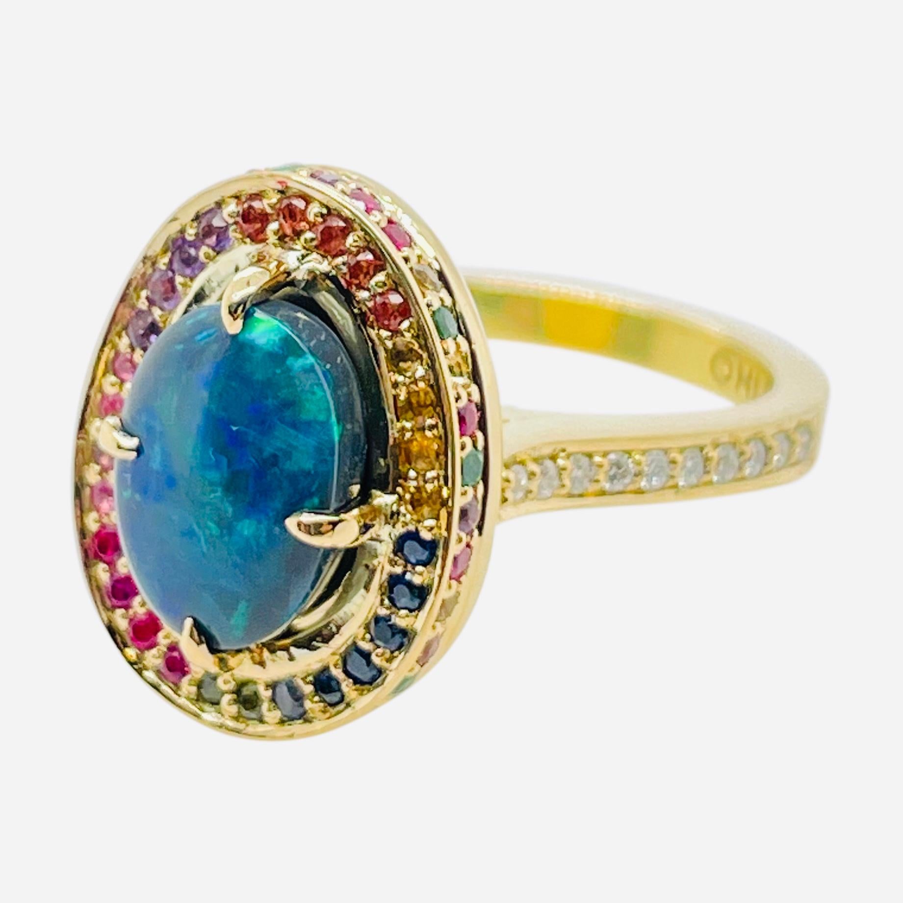 For Sale:  Rainbow Opal Ring in 18ct gold 5