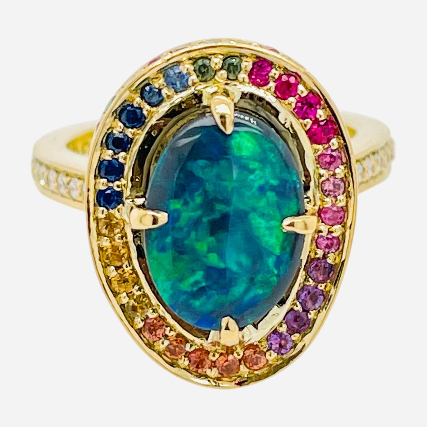 For Sale:  Rainbow Opal Ring in 18ct gold 8