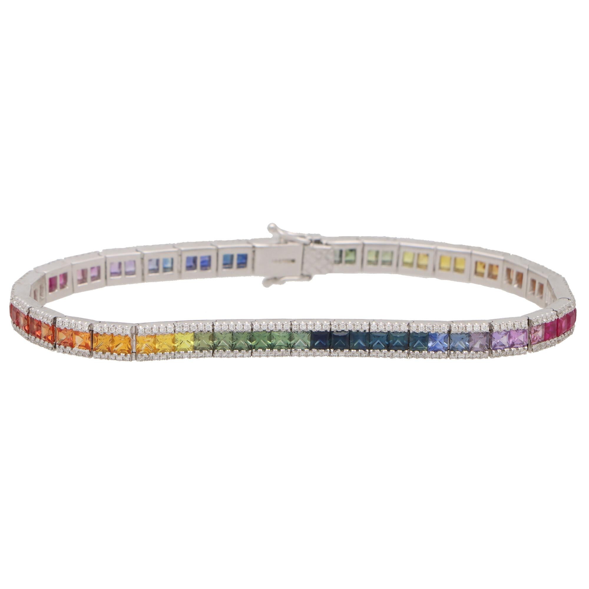  An extremely beautiful diamond and rainbow sapphire line bracelet set in 18k white gold. 

The bracelet is composed of exactly 70 princess-cut sapphires all varying in tone and colour. Within the bracelet we see a beautiful rainbow effect and the
