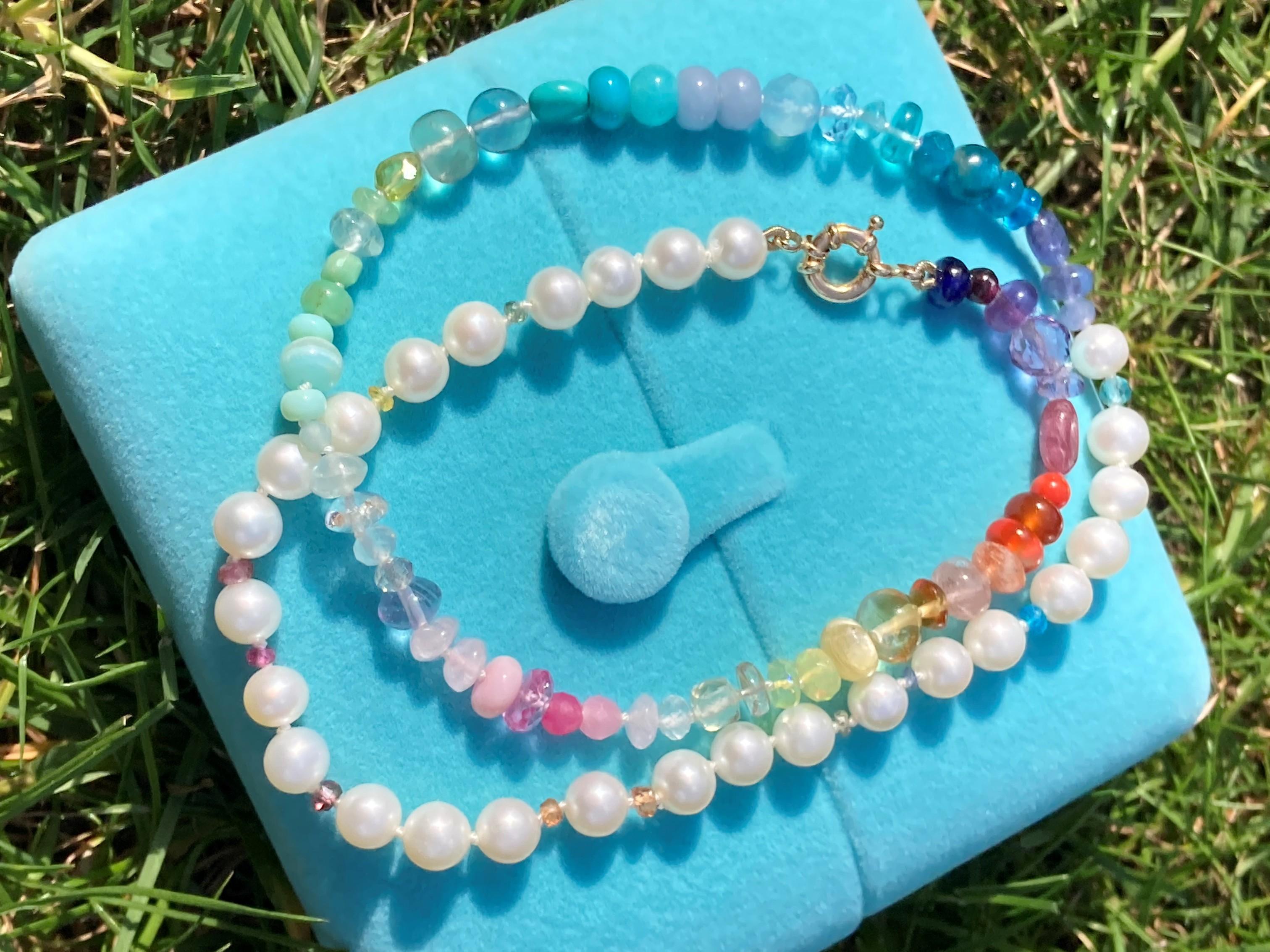 The classic pearl with a modern colorfull twist! Colored gemstones that follow the pattern of the rainbow, hand knotted and finished with an 14k solid gold clasp. Sparkle with pure rare gemstones that capture all colors of the rainbow. 

• Natural