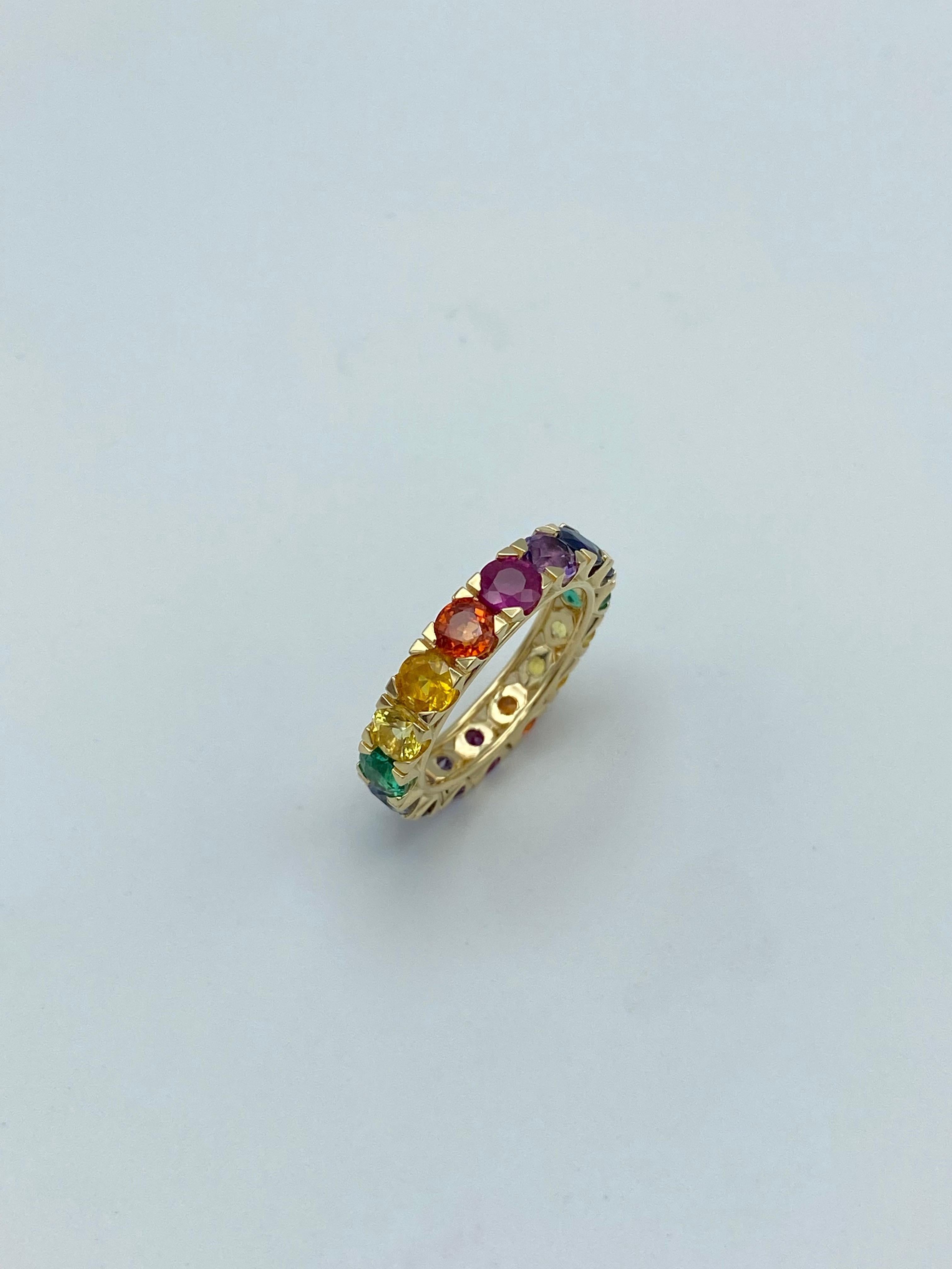 Artisan Rainbow Sapphire Emerald Ruby Semiprecious Stone 18Kt Gold Eternity Ring For Sale