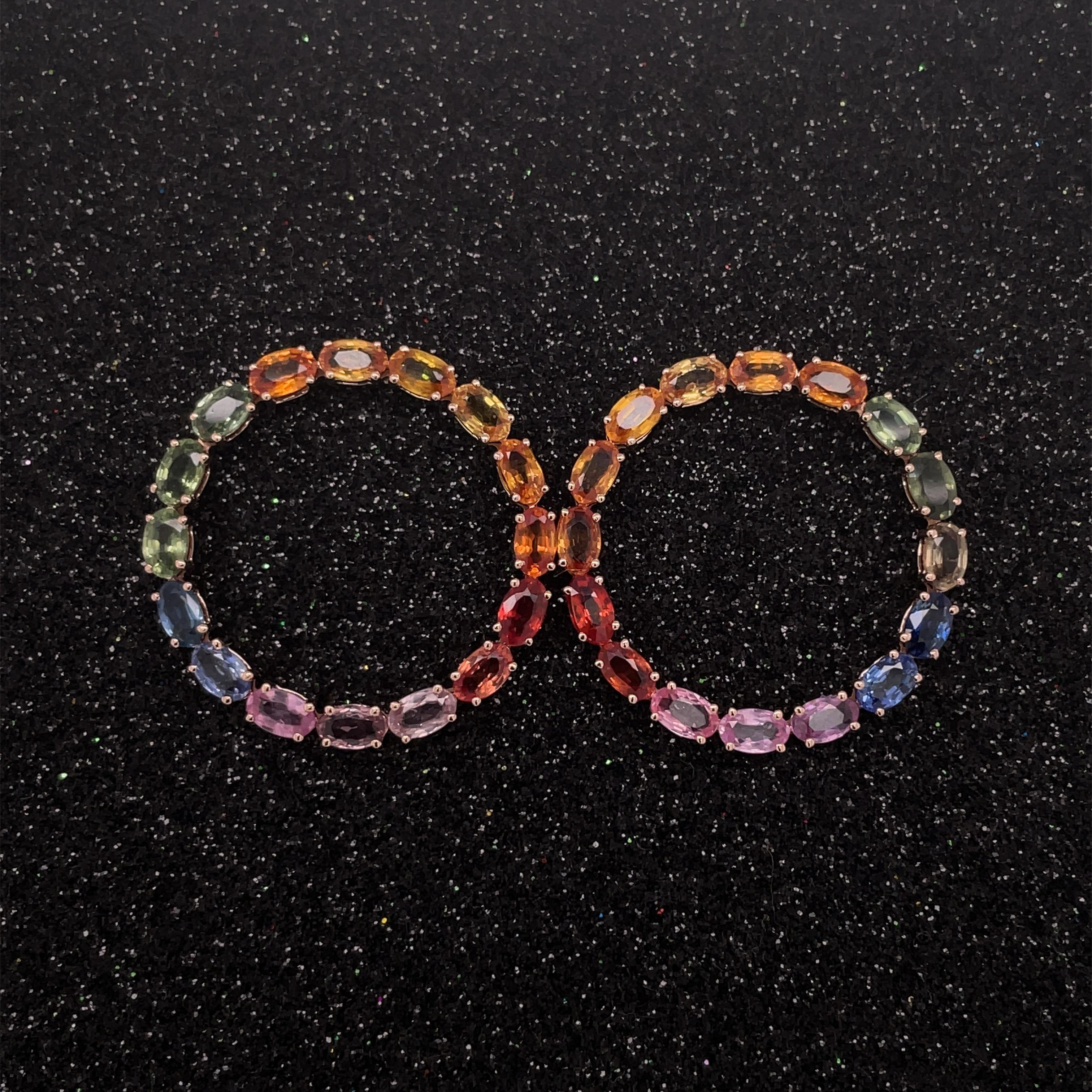 Stone : Yellow, Orange, Red, Blue, Pink and Green Sapphire
Type : Natural
Earring Weight-  5.48 gms
Shape : Oval
Size : 5x3 mm
Weight : 9.34 Carats
Metal : Rose Gold
Enhancement : Heated

Please allow 5-10% fluctuation in stone weight & gold weight