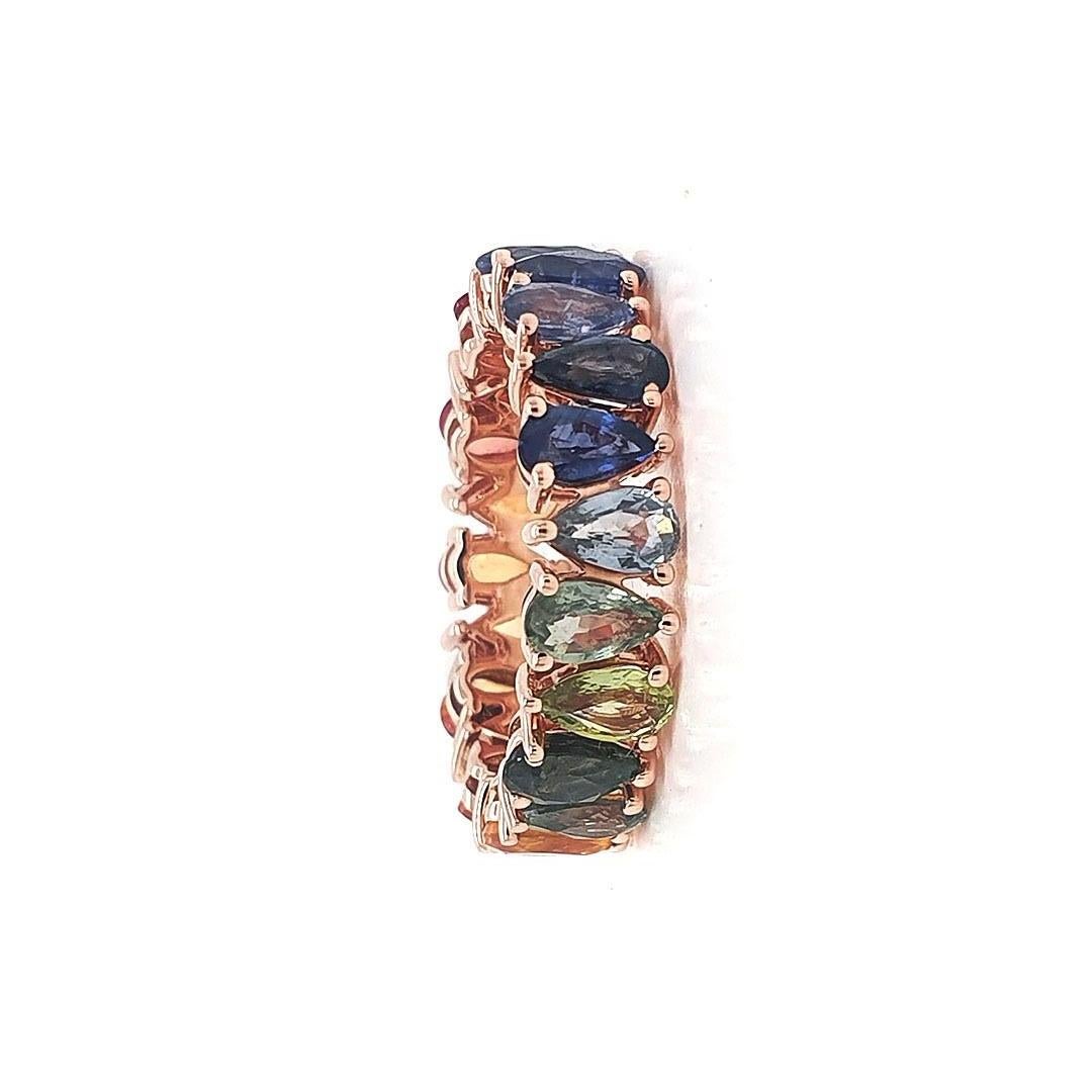 Stone : Yellow, Orange, Red, Pink, Blue and Green Sapphire
Type : Natural
Ring Weight : 4.22gms
Shape : Pear
Size : 5X3 mm
Weight :  5.77 Carats
Ring size : US 6.25
Metal : Rose Gold
Enhancement : Heated

Please allow 5-10% fluctuation in stone