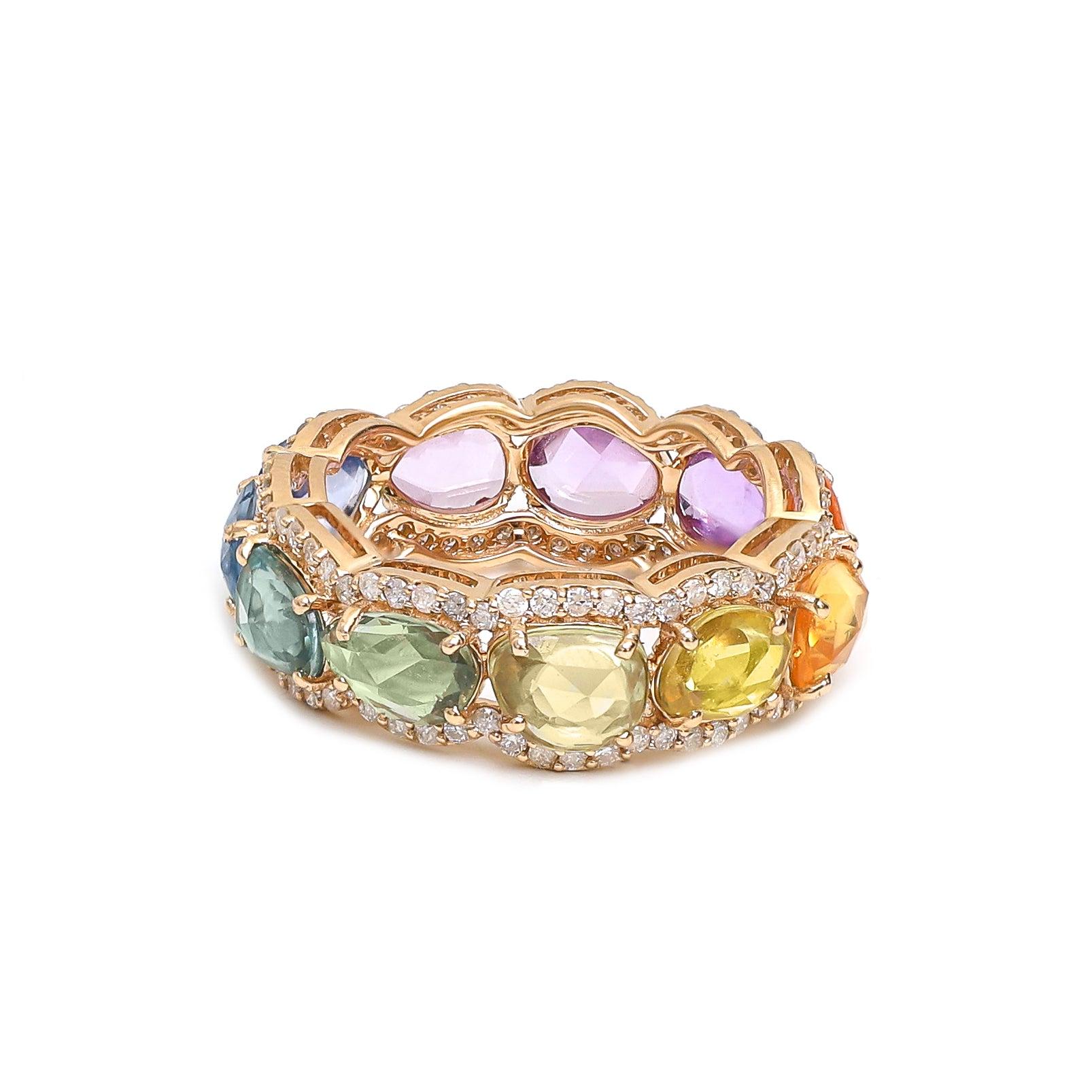 Rainbow Sapphire Rose Cut and Diamond Ring

This classic rainbow sapphire rose cut eternity band has high lustre sapphires which gives the ring very raw, organic and flow-y look. The sapphires are all natural and have perfect pastel hues. This ring