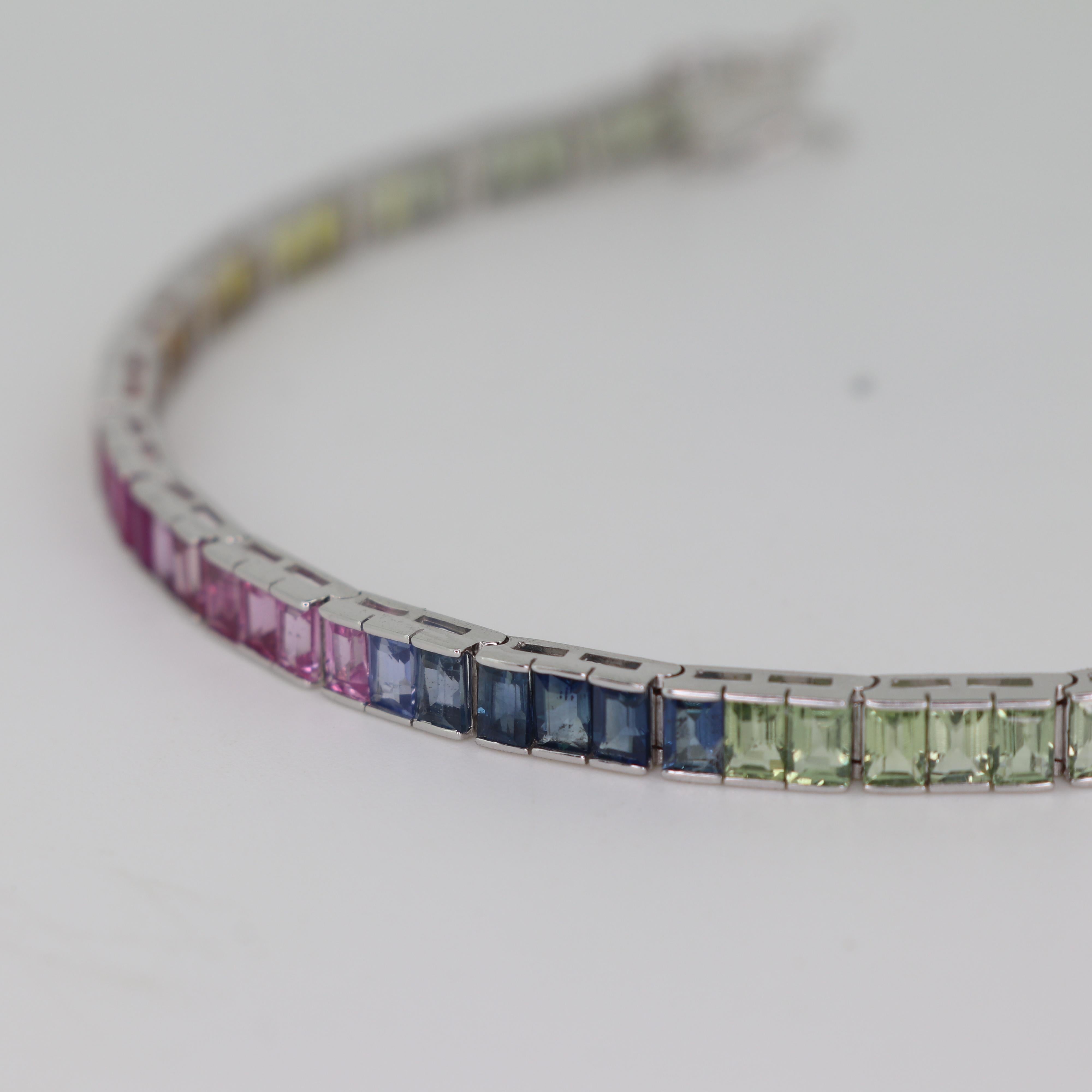 Rainbow Sapphire Tennis Bracelet - Baguettes in 18K White Gold In New Condition For Sale In Bangkok, TH