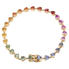 Bracelet à maillons trillion en or 18 carats avec saphirs arc-en-ciel
