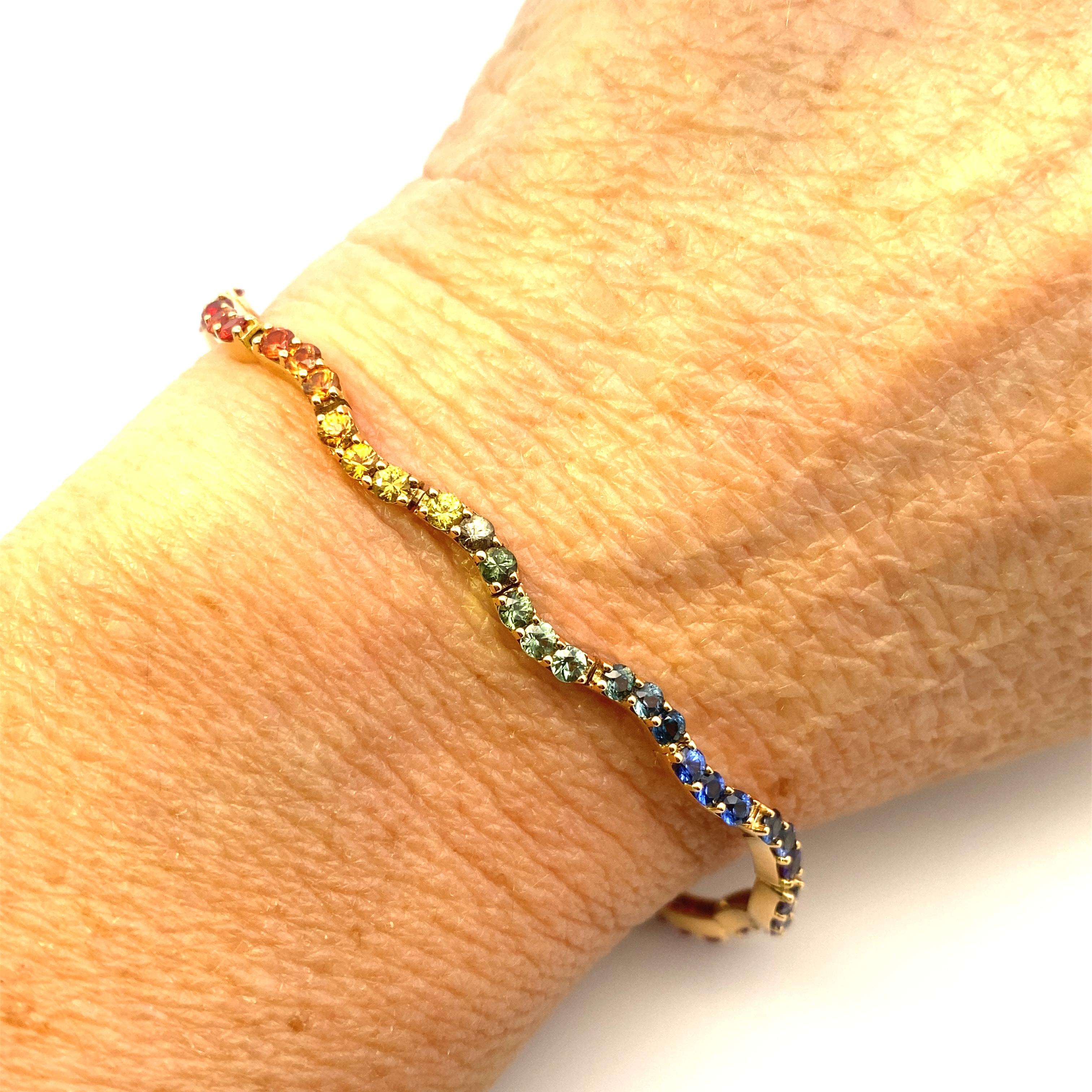 Rainbow Sapphire Yellow Gold Wavy Tennis Bracelet For Sale 1