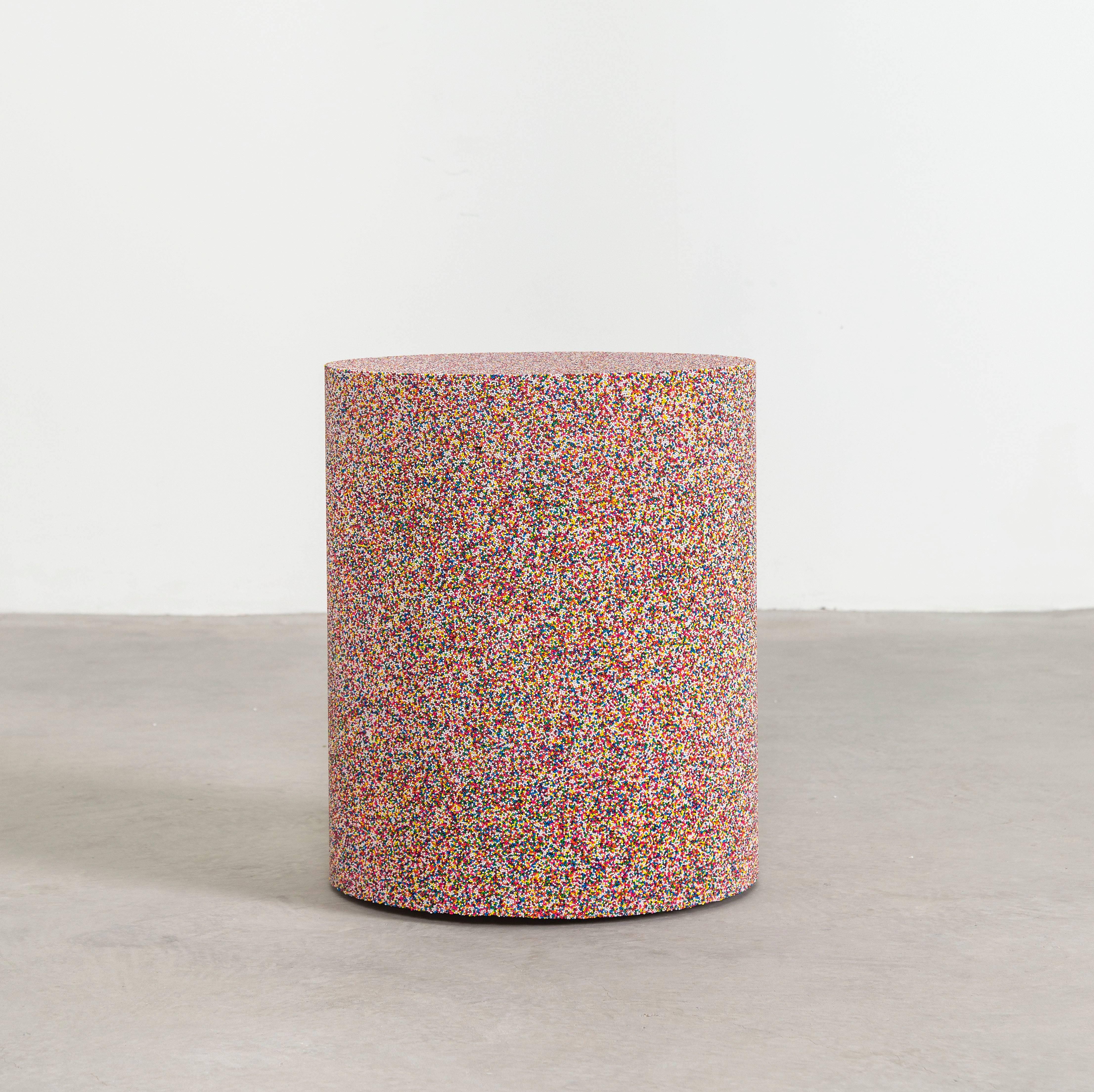 Composed from rainbow sprinkles, the made-to-order drum has a hollow cavity and maintains an organic texture and sophisticated composition. The piece has a hollow cavity and weighs approximately 40lbs.