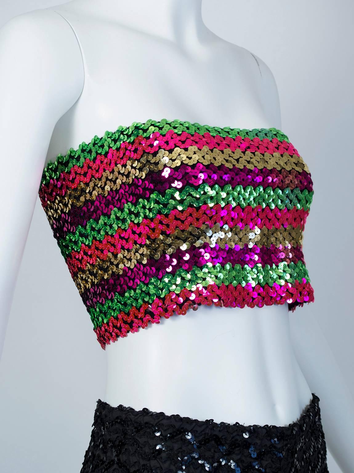 A small top that packs a wallop, this bandeau would have been perfectly at home skating around the dance floor at Studio 54. Bright, narrow and eye-catching, it's an instant party wherever it goes.

Rectangular tube top with elastic acrylic/acetate