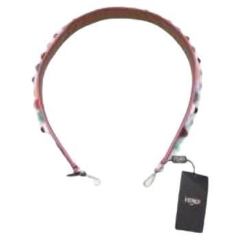 Fendi Rainbow Stud Strap You Bag Strap
 
 - Multicoloured pyramid studded bag strap 
 - Silver-tone hardware 
 - Pink trim with brown leather interior 
 
 Materials
 Leather
 
 PLEASE NOTE, THESE ITEMS ARE PRE-OWNED AND MAY SHOW SIGNS OF BEING