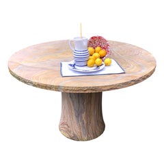 Table à manger ronde « Rainbow » en teck et pierre, collection « Rise » de Paul Mathieu