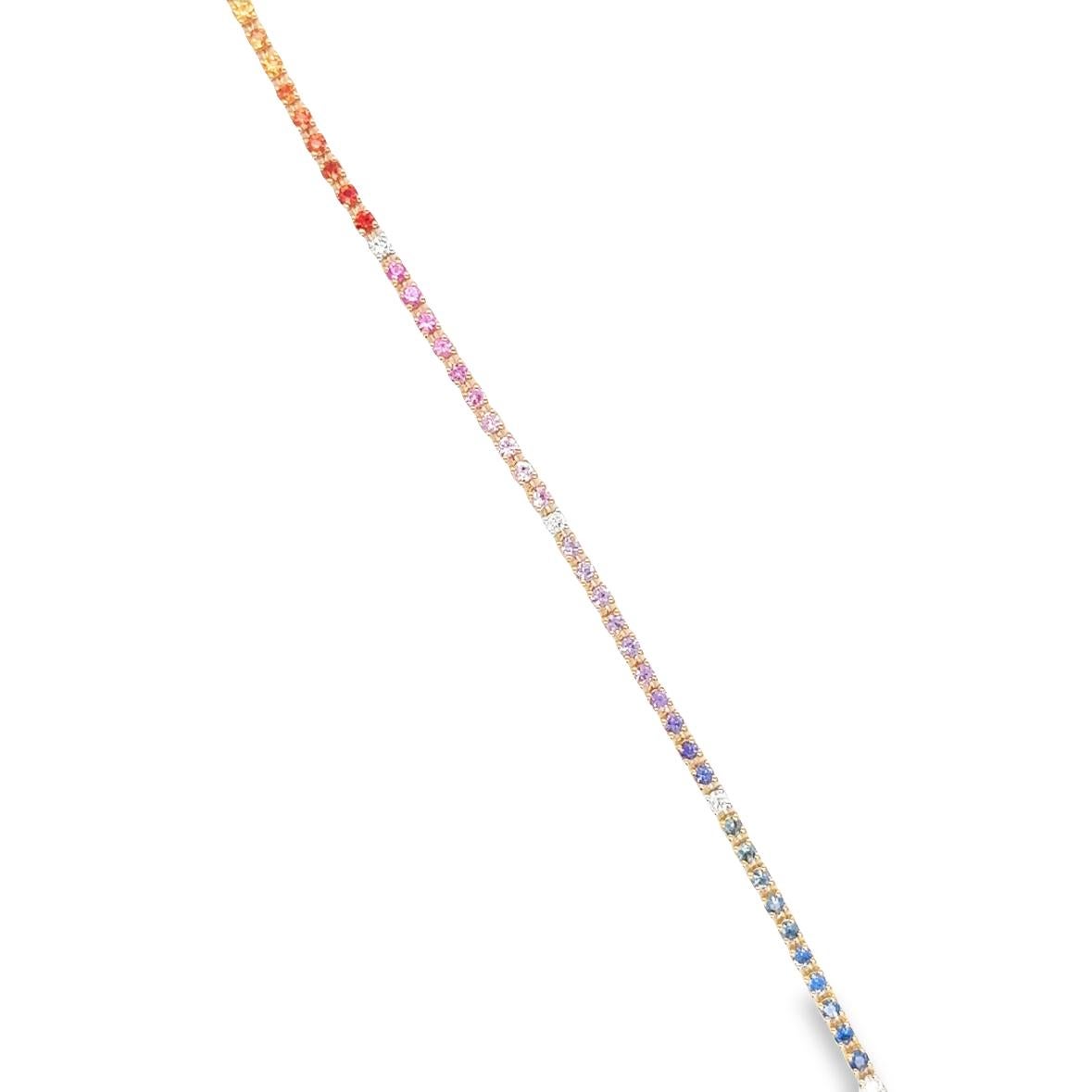 The RIAD Tennis Bracelet is elegantly designed in 18Kt rose gold, with a weight of 7.74 grams. It features a stunning combination of Colored Sapphires, totaling 2.13 carats, and is adorned with Diamonds of G color and VS clarity, amounting to 0.16