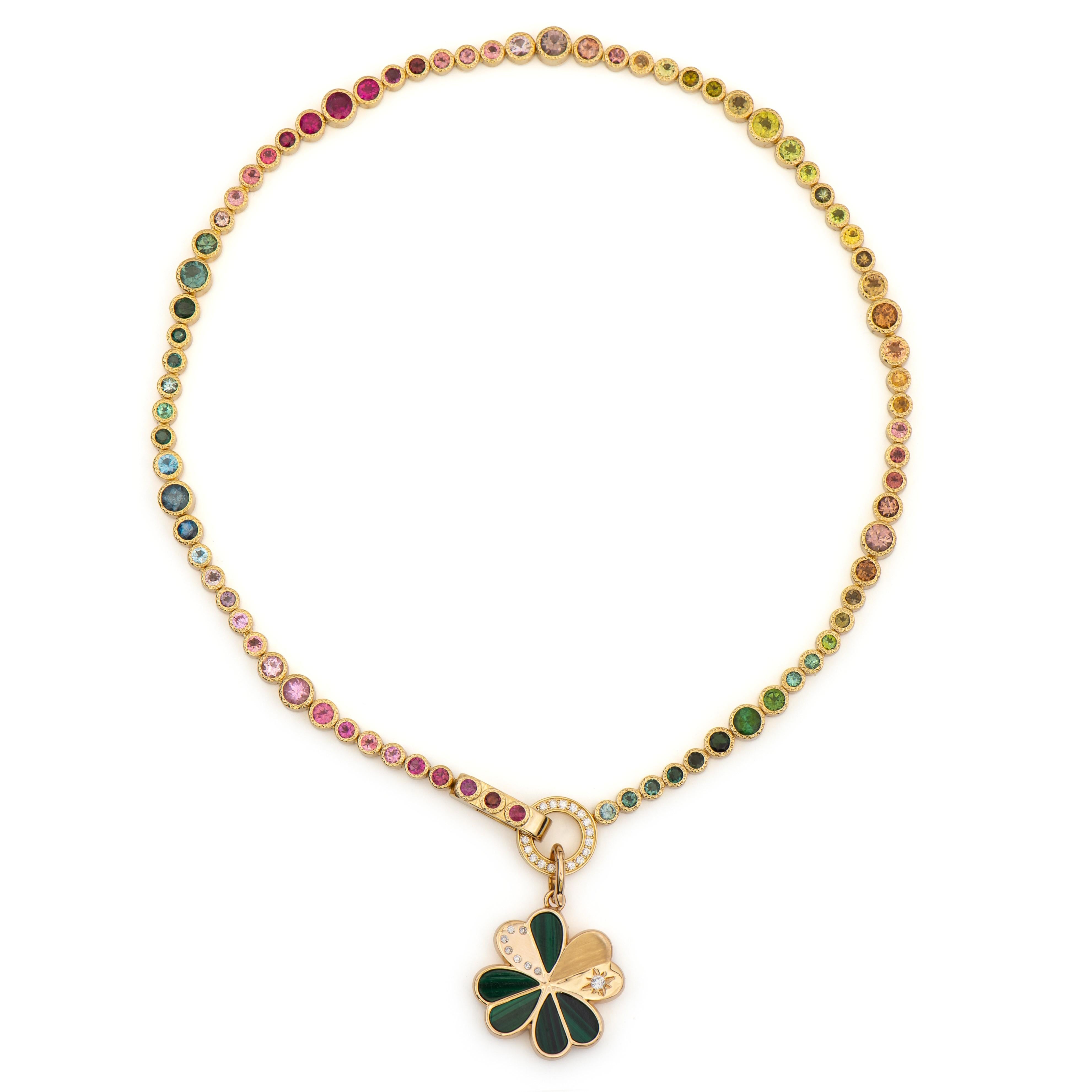 Tell your story... This 14K Yellow Gold, Diamond and Rainbow Tourmaline Chain features 19.9 carats of mixed colored tourmaline with 0.08 TCW of round faceted diamonds. Chain is one of a kind and 16 inches in length. Sold without the pendant. 
