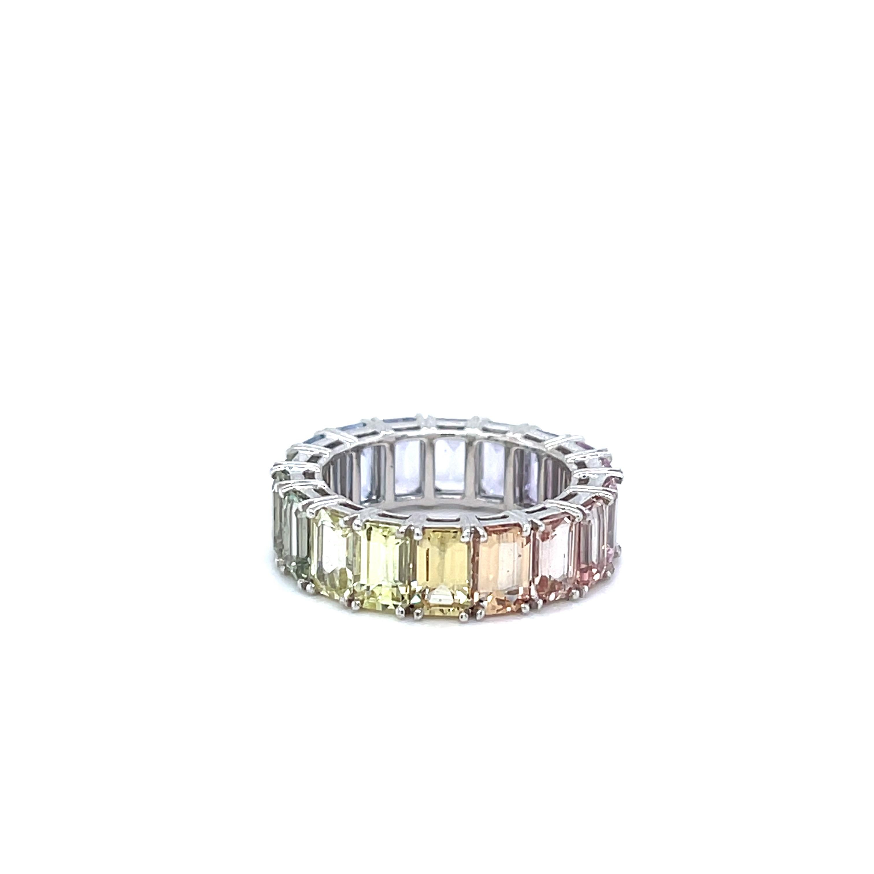 Unleash the Magic of Color with a Rainbow Sapphire Eternity Ring (7.75ct)

Celebrate individuality and vibrant beauty with this captivating rainbow sapphire eternity ring. Featuring 18 unheated sapphires totaling 7.75 carats, this ring showcases a