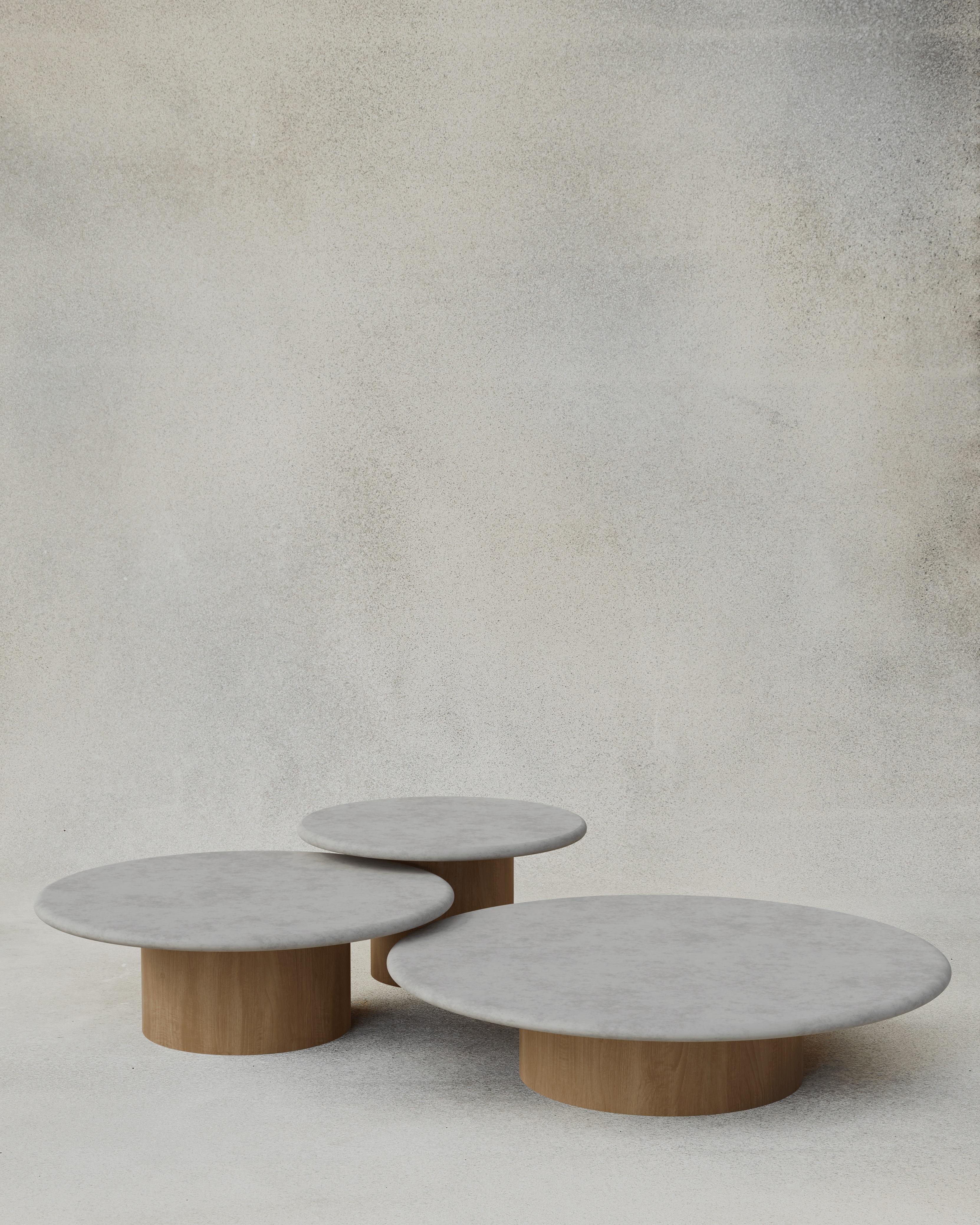 With their circular profiles, varying proportions and potential to be nested, these versatile tables evoke the pattern of raindrops in a pool of water when placed together.

Bought as a set of 600, 800, 1000, we add a 10% discount

Tops: Black