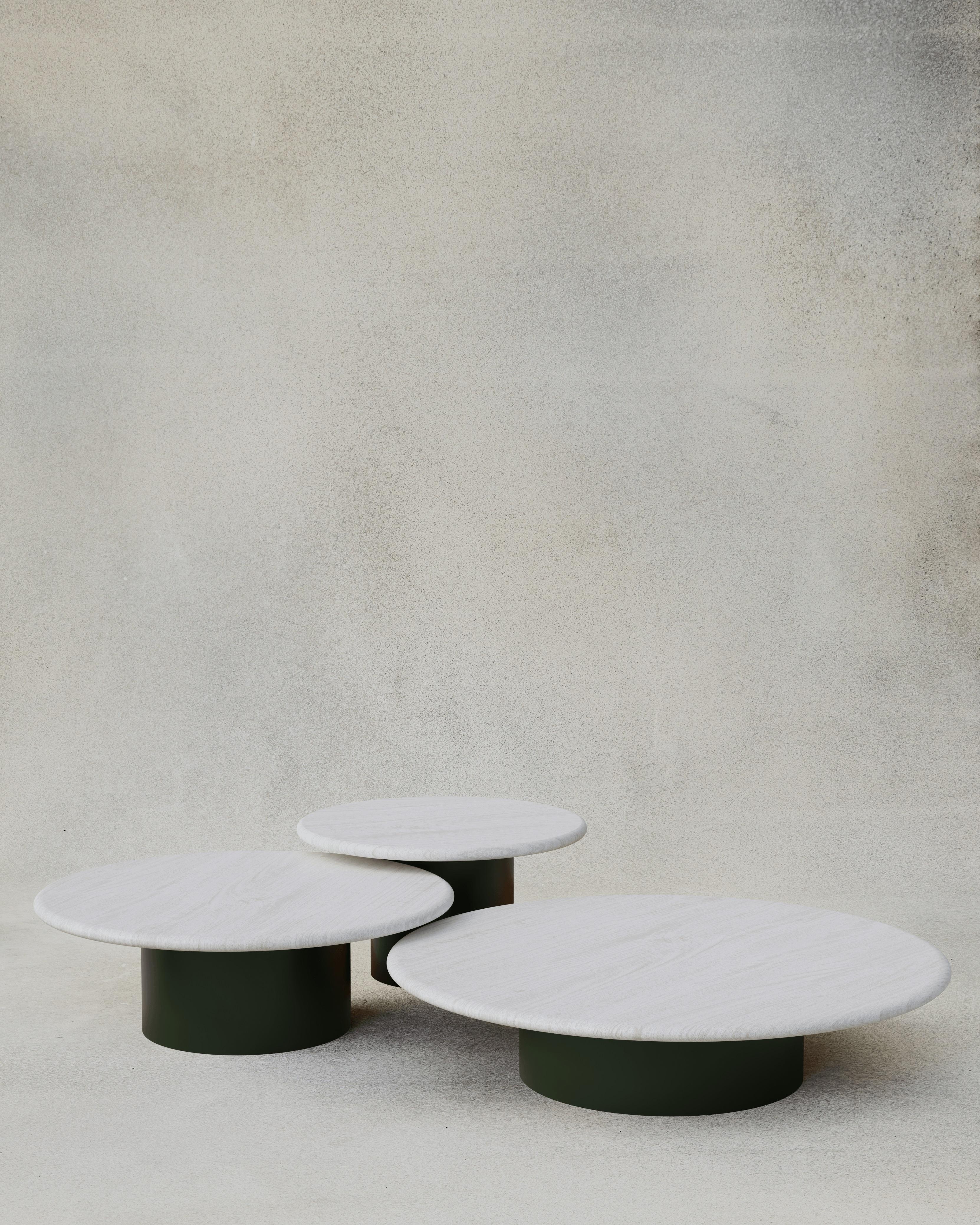 With their circular profiles, varying proportions and potential to be nested, these versatile tables evoke the pattern of raindrops in a pool of water when placed together.

Bought as a set of 600, 800, 1000, we add a 10% discount

Tops: Black