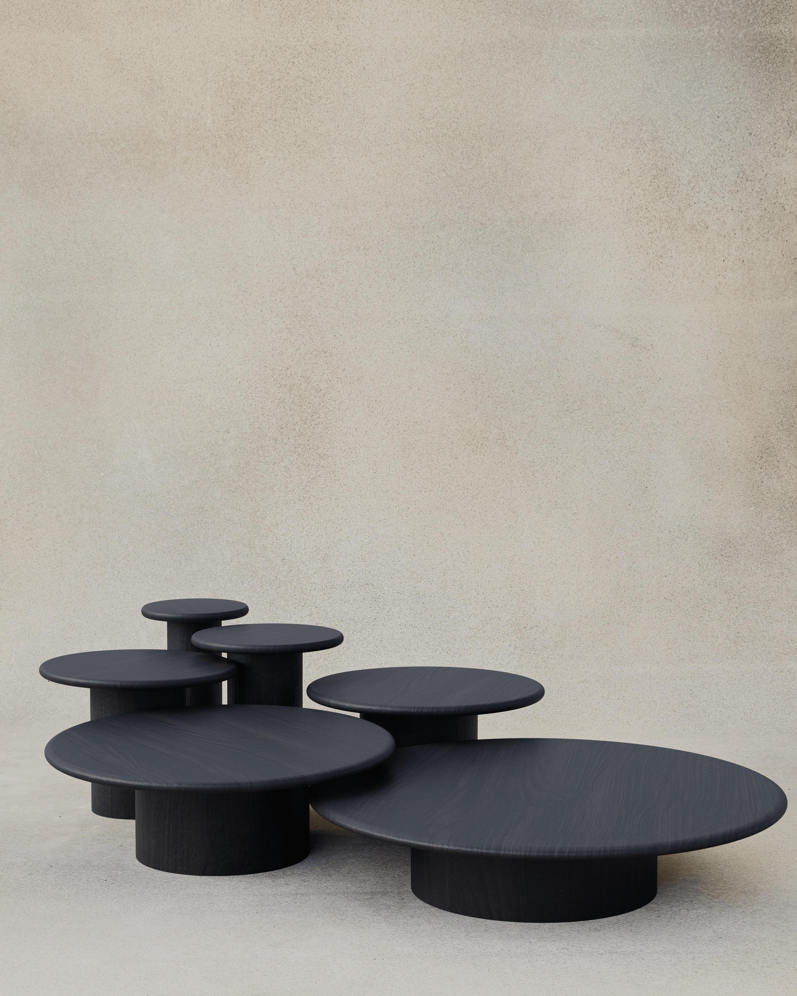 With their circular profiles, varying proportions and potential to be nested, these versatile tables evoke the pattern of raindrops in a pool of water when placed together.

Bought as a full set of 300, 400, 500, 600, 800 and 1000, we add a 10%