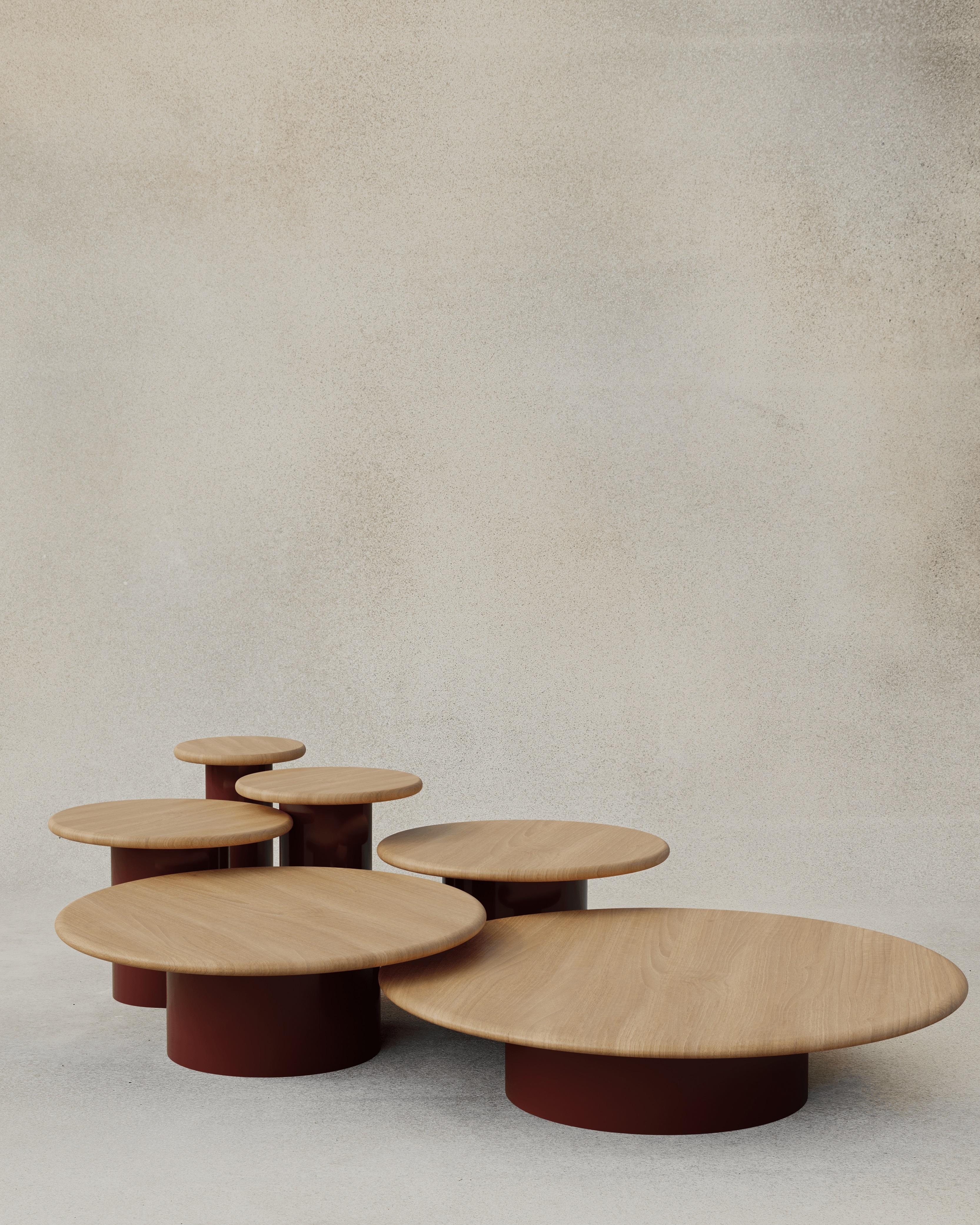 With their circular profiles, varying proportions and potential to be nested, these versatile tables evoke the pattern of raindrops in a POOL of water when placed together.

Bought as a full set of 300, 400, 500, 600, 800 and 1000, we add a 10%