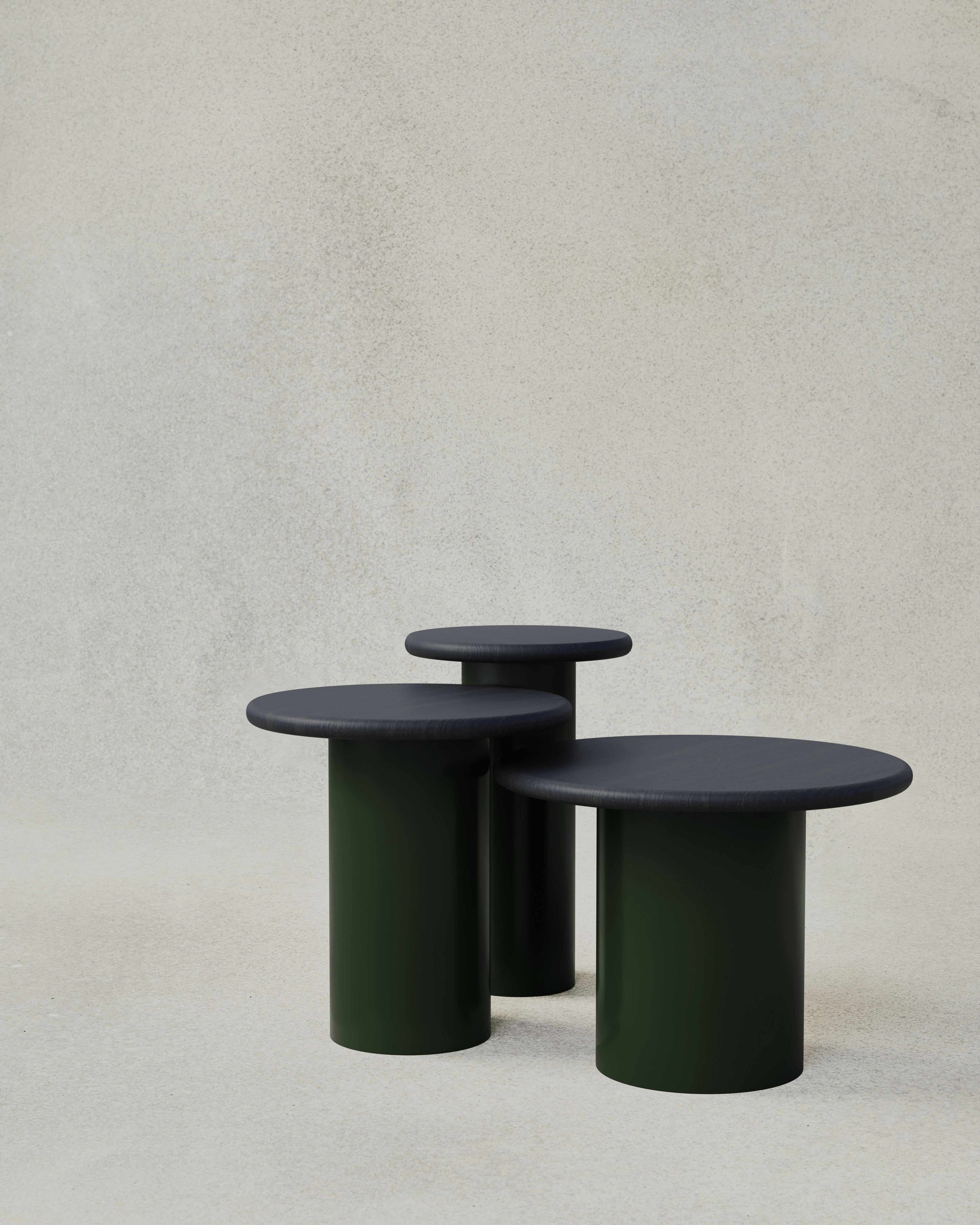 With their circular profiles, varying proportions and potential to be nested, these versatile tables evoke the pattern of raindrops in a POOL of water when placed together.

Bought as a set of 300, 400, 500, we add a 10% discount

Tops: Black