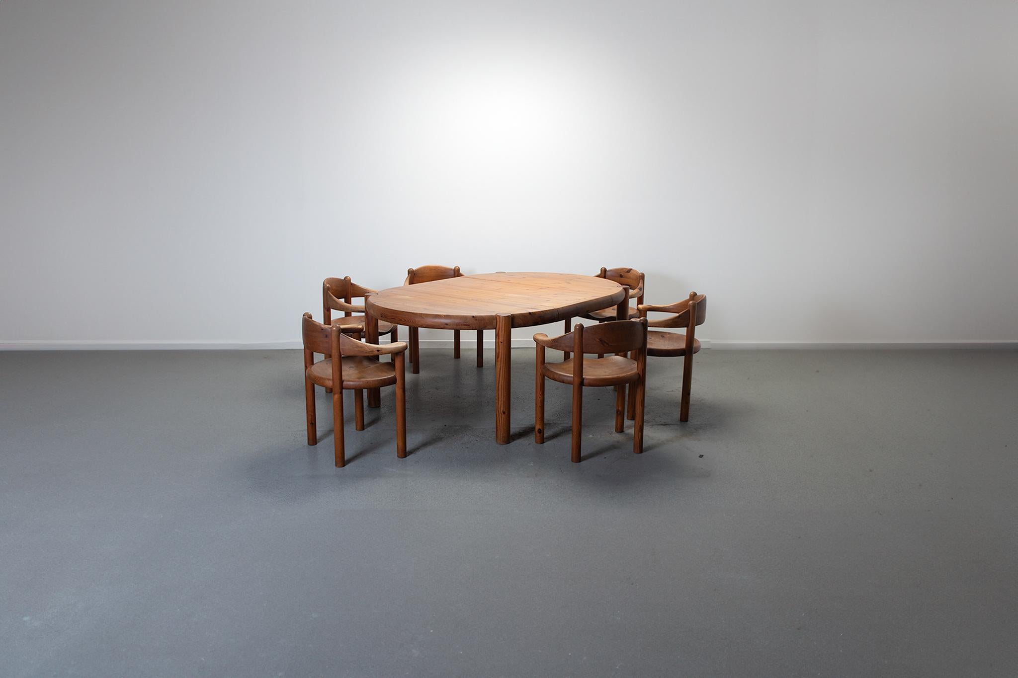 Extending dinging table and 6x armchairs by Rainer Daumille.

The sed is made from pine in the 1980s.

In good vintage condition with signs of use consistent with age.

The chairs have a nice patina on the seats.

The table is i very good condition.