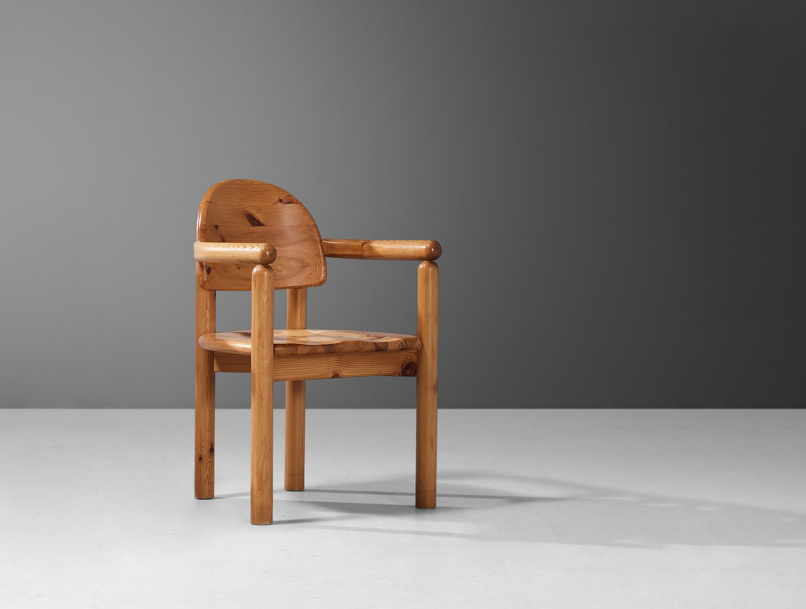 Rainer Daumiller for Hirtshals Savvaerk, armchair, pine, Denmark, 1970s.
 
This armchair by Danish designer Rainer Daumiller shows multiple beautiful organic features. The vivid grain of the warm pine wood contributes to the natural expressiveness
