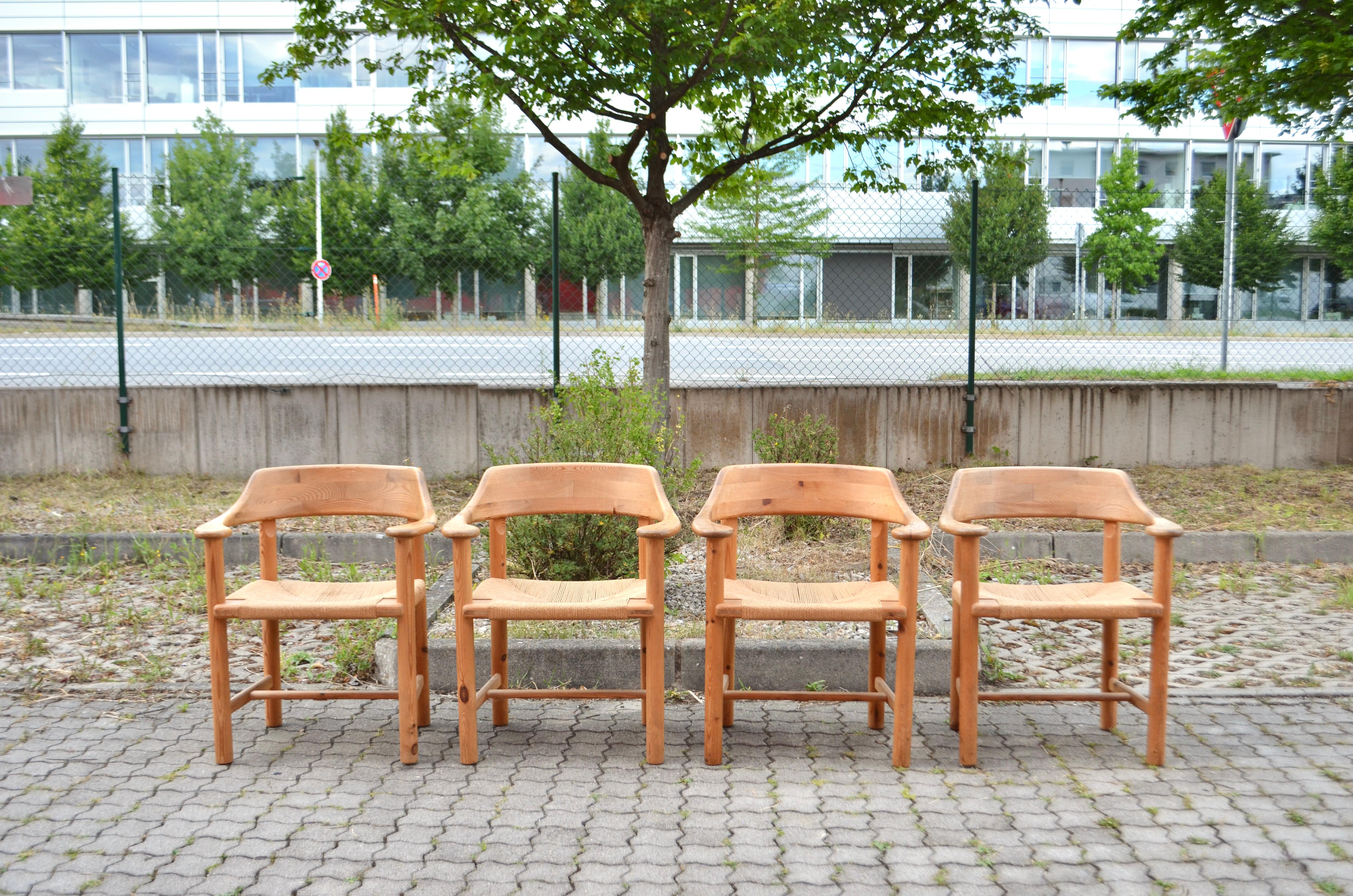Dining chairs designed by Rainer Daumiller and manufactured by Hirtshals Savvaerk.
Model with papercord and armrests.
Solid scandinavian pine wood which is beautiful patinated.
These chairs are very comfortable.

Set of 4 chairs.

Dimensions