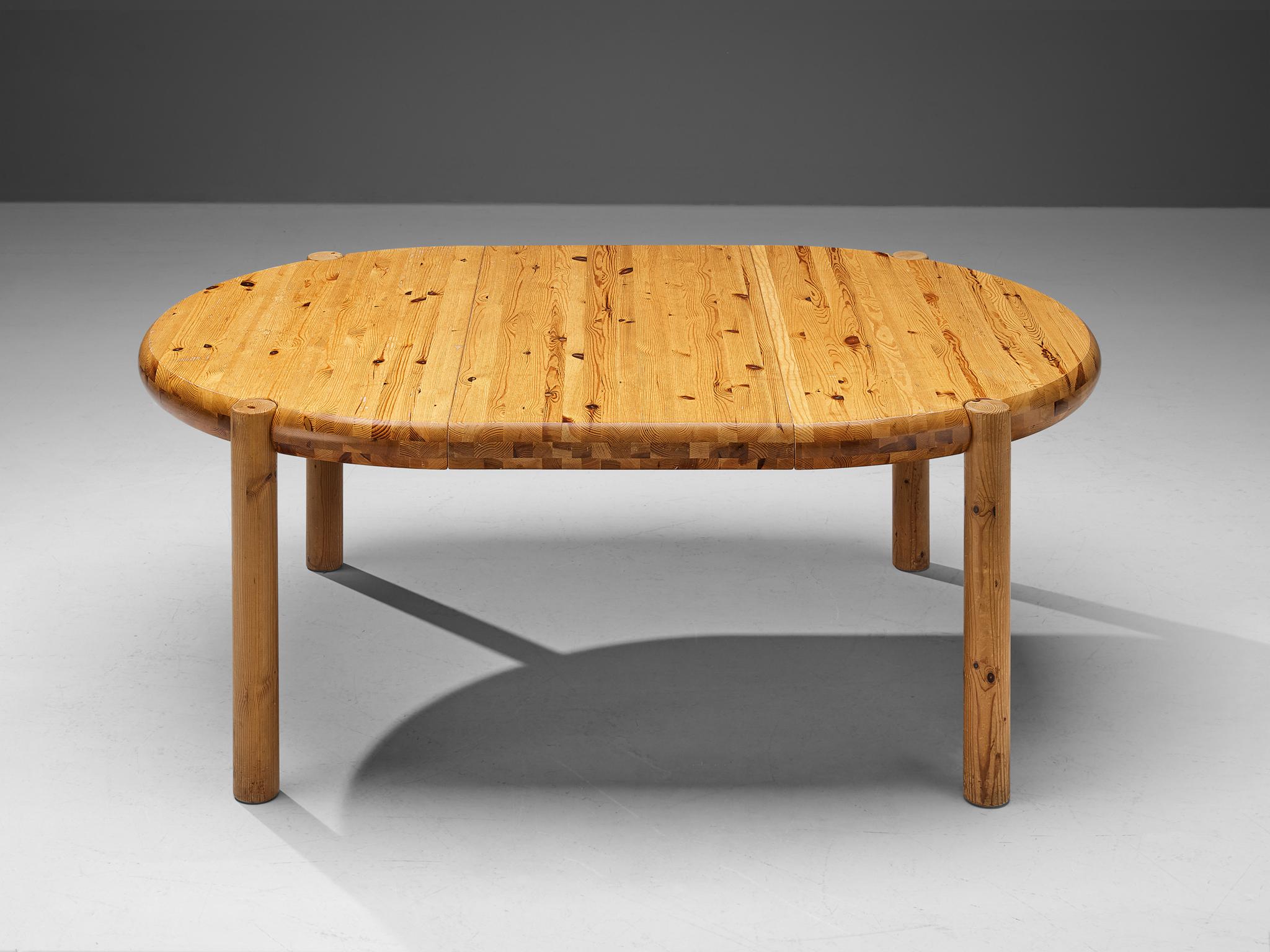 Rainer Daumiller, extendable dining table, pine, Denmark, 1970s.

This simplistic table with absence of decorative details, convinces visually through the well-balanced appearance and the stabile construction. Functional design that features a