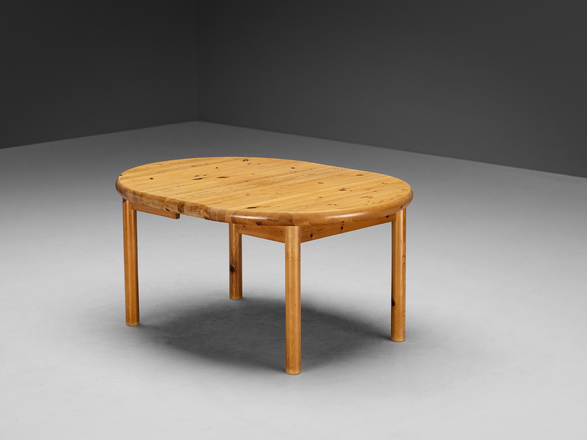Rainer Daumiller, extendable dining table, pine, Denmark, 1970s.

Robust dining table in solid pine, designed by Rainer Daumiller. A functional design that features a rounded tabletop when not extended and an oval top when one leaf is added to the