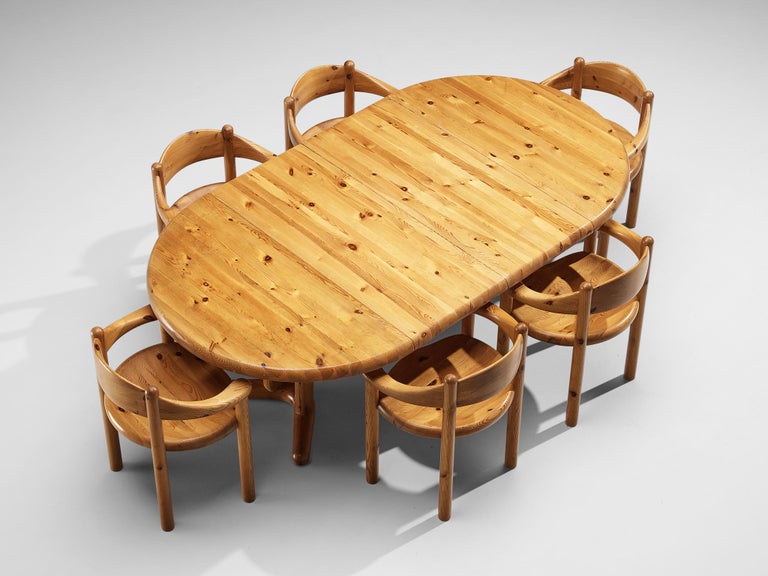 Rainer Daumiller, set of dining table with six armchairs, pine, Denmark, 1970s.

This dining room set contains an extendable dining table and six dining chairs, designed by Rainer Daumiller. The table can be configured into three versions by means