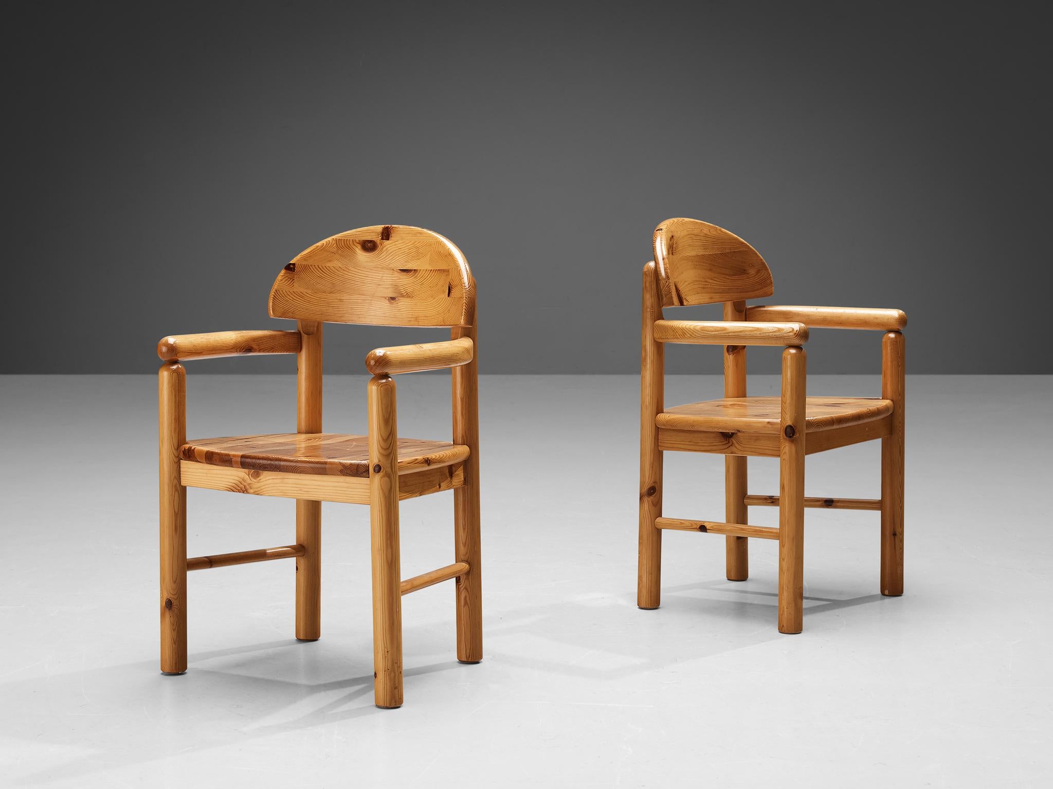 Rainer Daumiller for Hirtshals Sawmill, pair of dining chairs, pine, Denmark, 1970s

This pair of armchairs by Danish designer Rainer Daumiller has multiple features. The vivid grain of the warm pine wood contributes to the natural expressiveness of