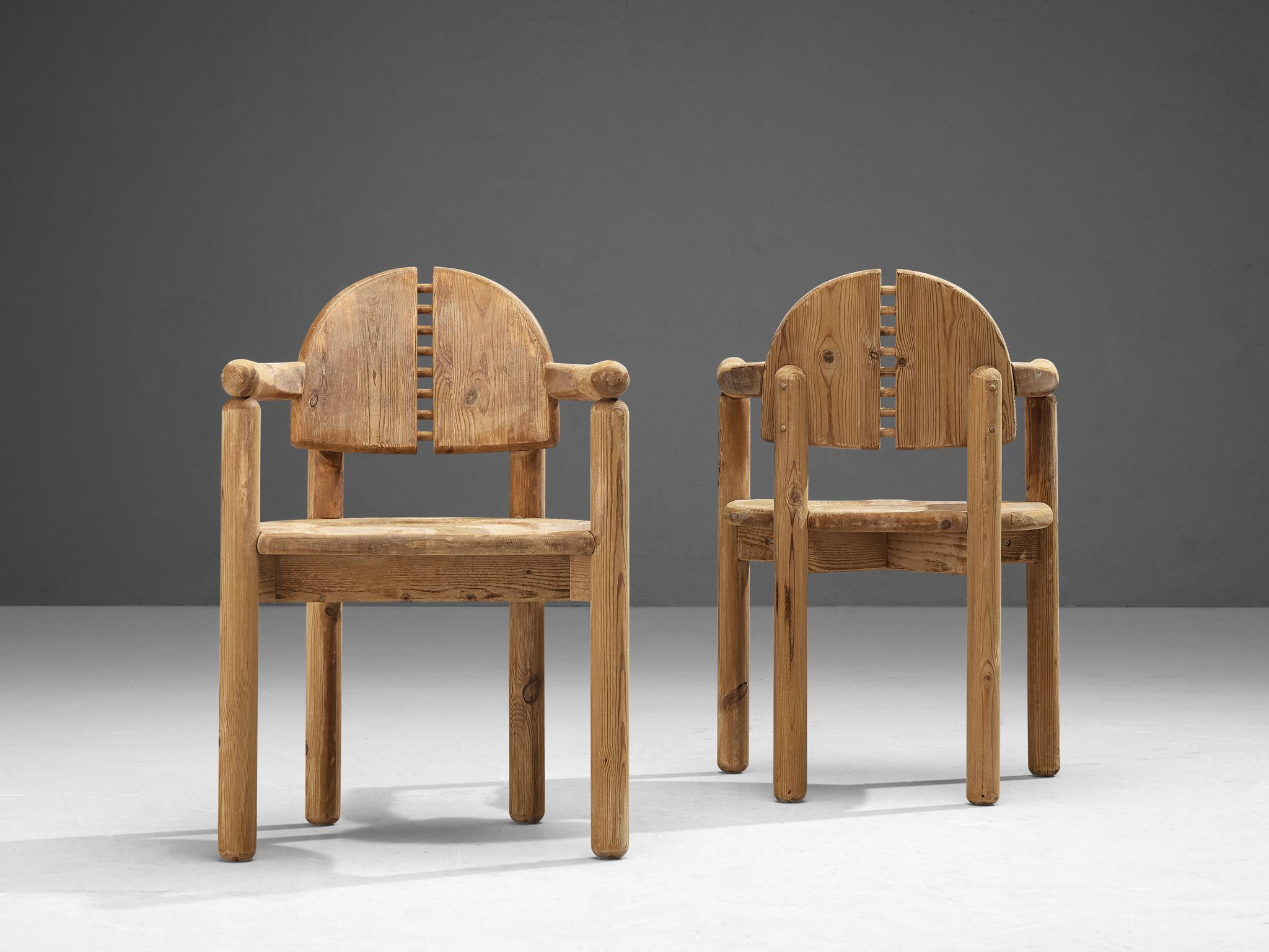 Rainer Daumiller for Hirtshals Savvaerk, pair of dining chairs, pine, Denmark, 1970s.

Beautiful pair of organic and natural armchairs in solid pine. A simplistic design with a large seating and attention for the natural expression and grain of the