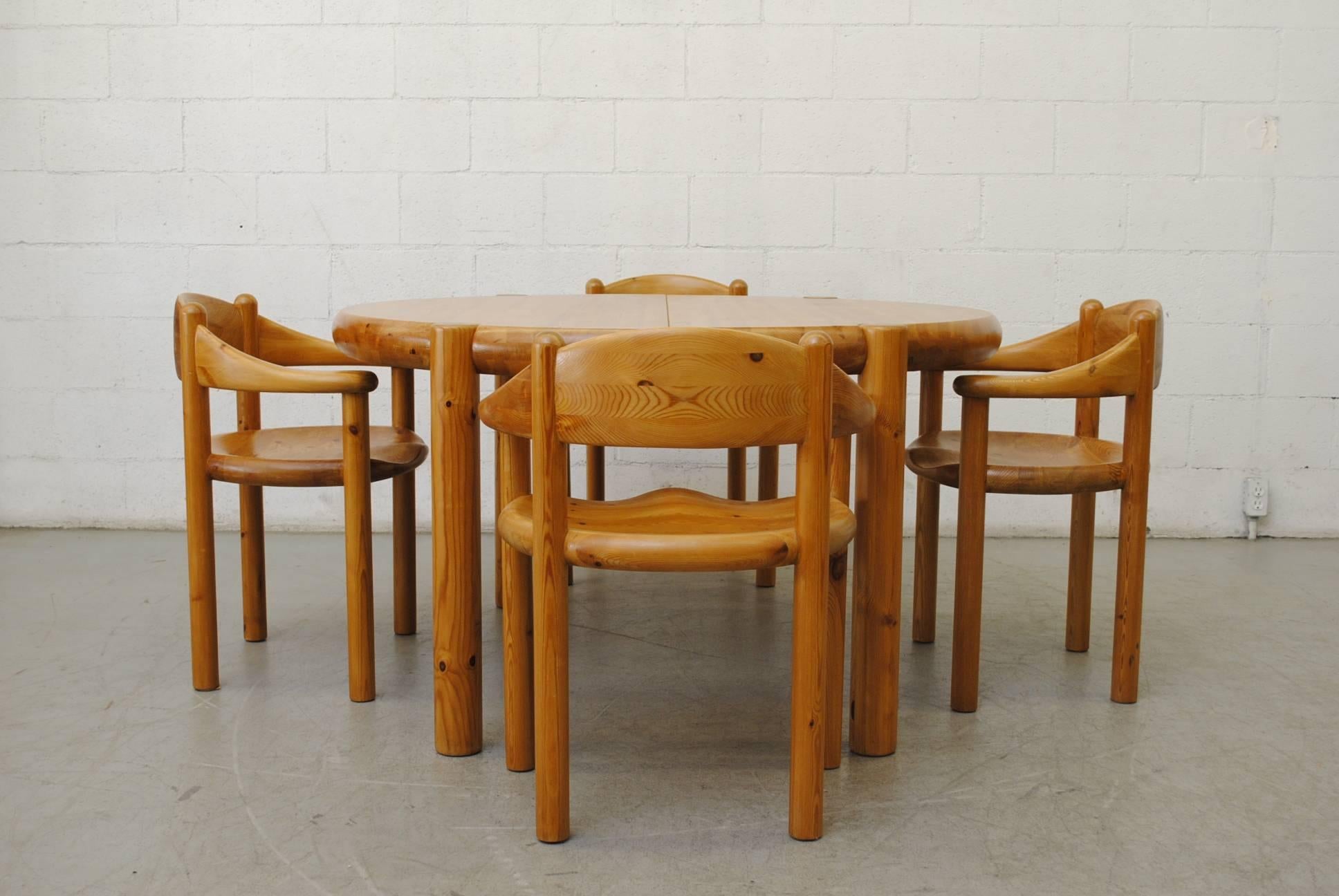 Gorgeous pine dining set! Designed by Rainer Daumiller for Hirtshals Savvaerk, Denmark. Lightly Refinished. Round table with two extension leaves and six matching dining chairs. Set price. Measure: With leaf- 98