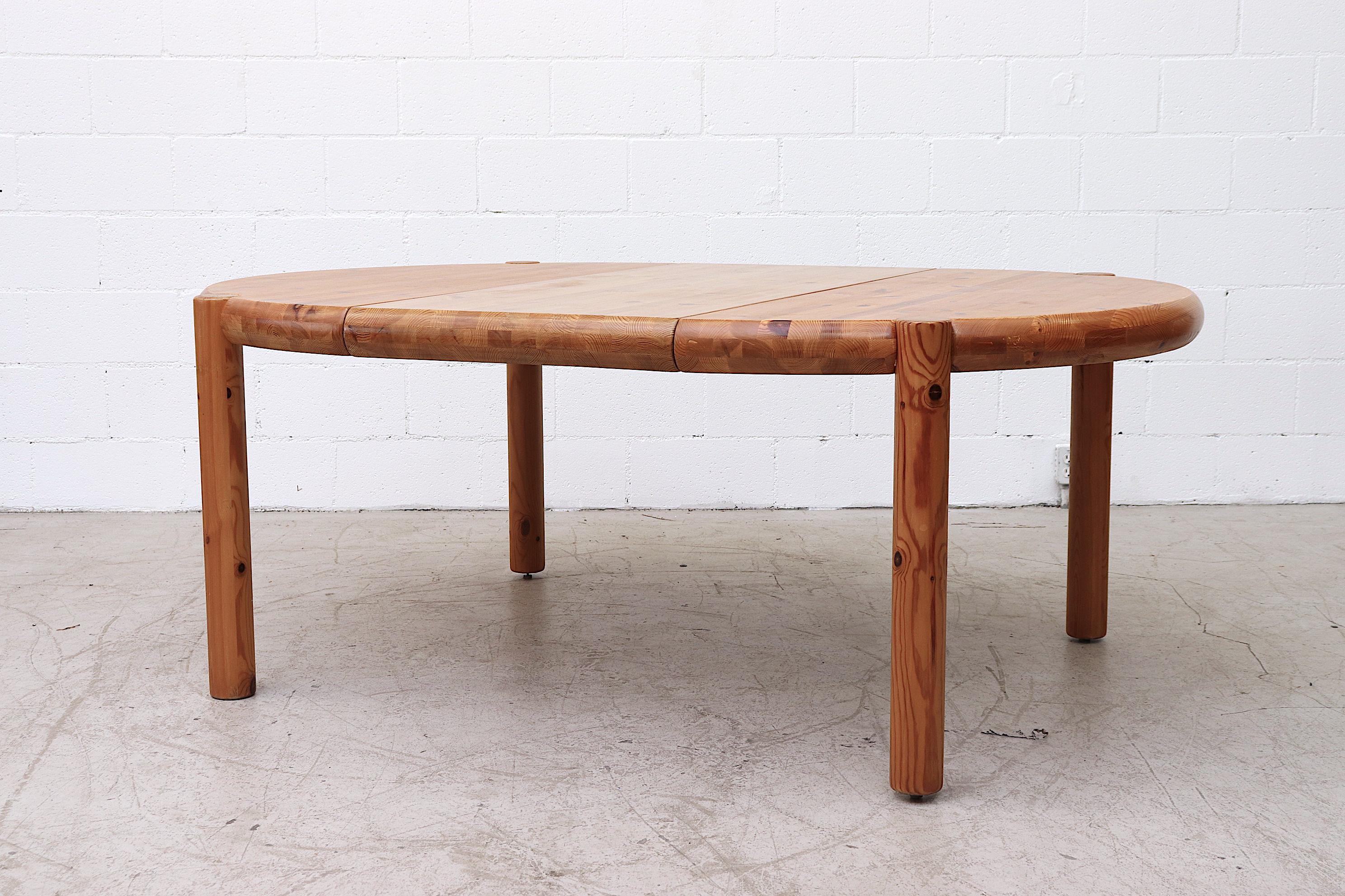 Gorgeous pine dining table! Designed by Rainer Daumiller for Hirtshals Savvaerk, Denmark. Lightly Refinished. Round table with one 23
