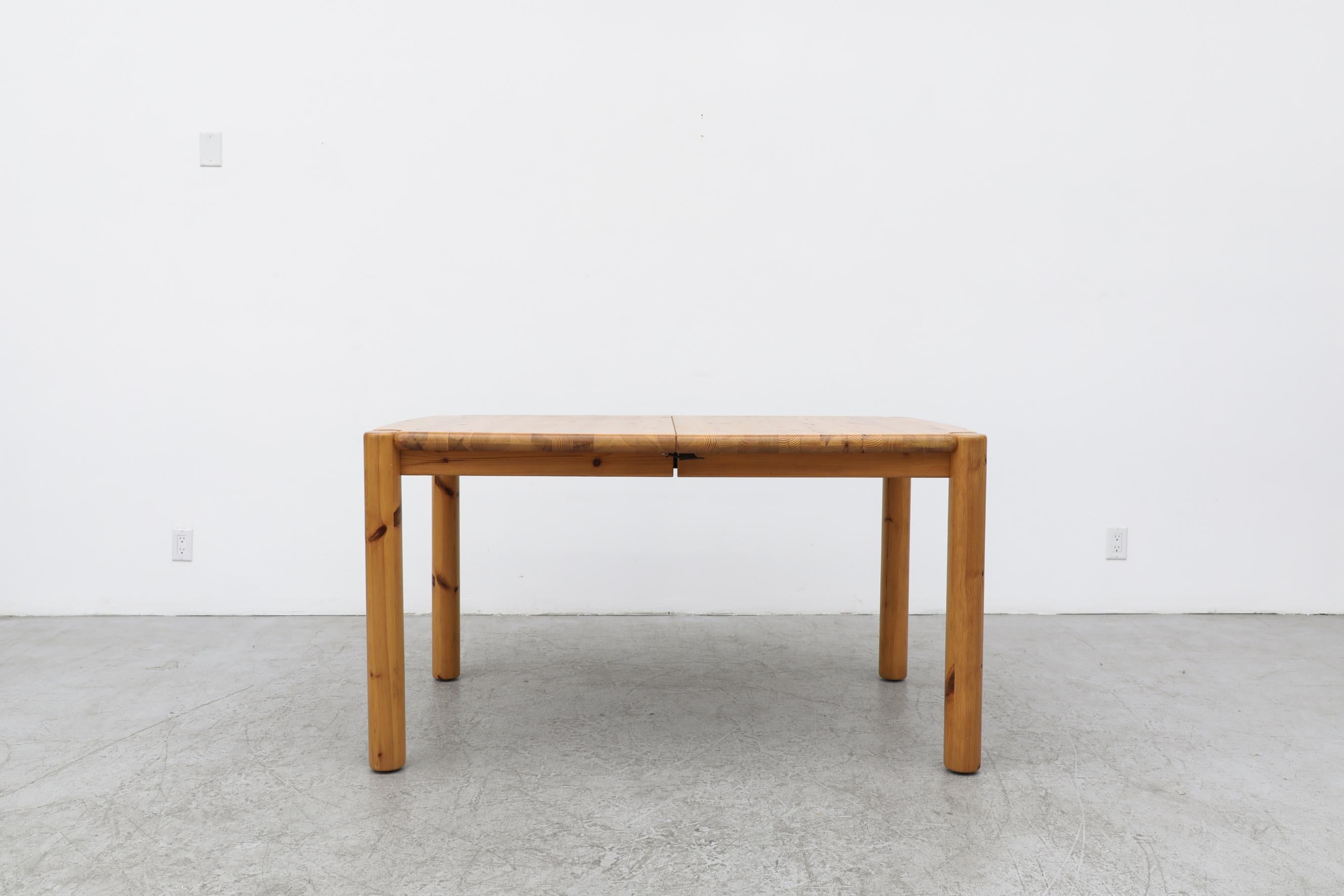 Beautiful pine dining table with a leaf by Rainer Daumiller for Hirtshals Savvaerk, Denmark. In original condition with a few light signs of wear, consistent with its age and use. It measures 75.12